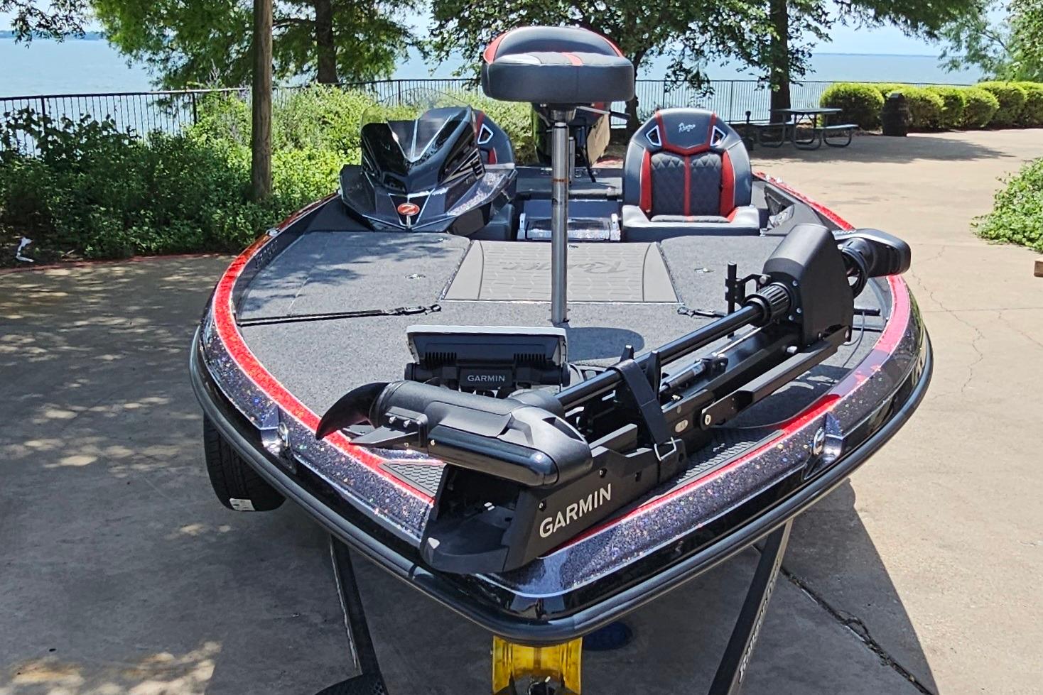 2026 Ranger Z520R fishing boat with Garmin equipment, parked near a scenic lakeside.
