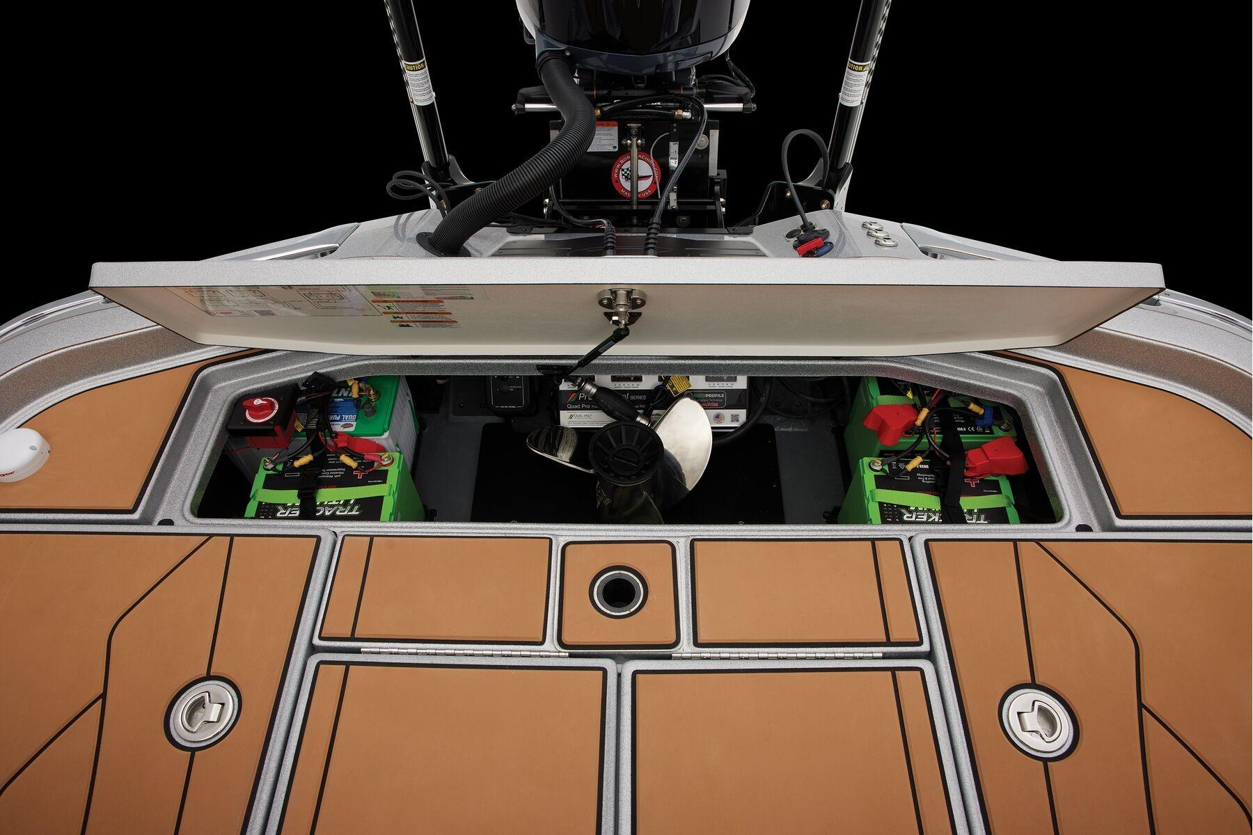 Manufacturer Provided Image: 2026 Ranger Z520R Ultra boat interior with open hatch, revealing batteries and equipment.