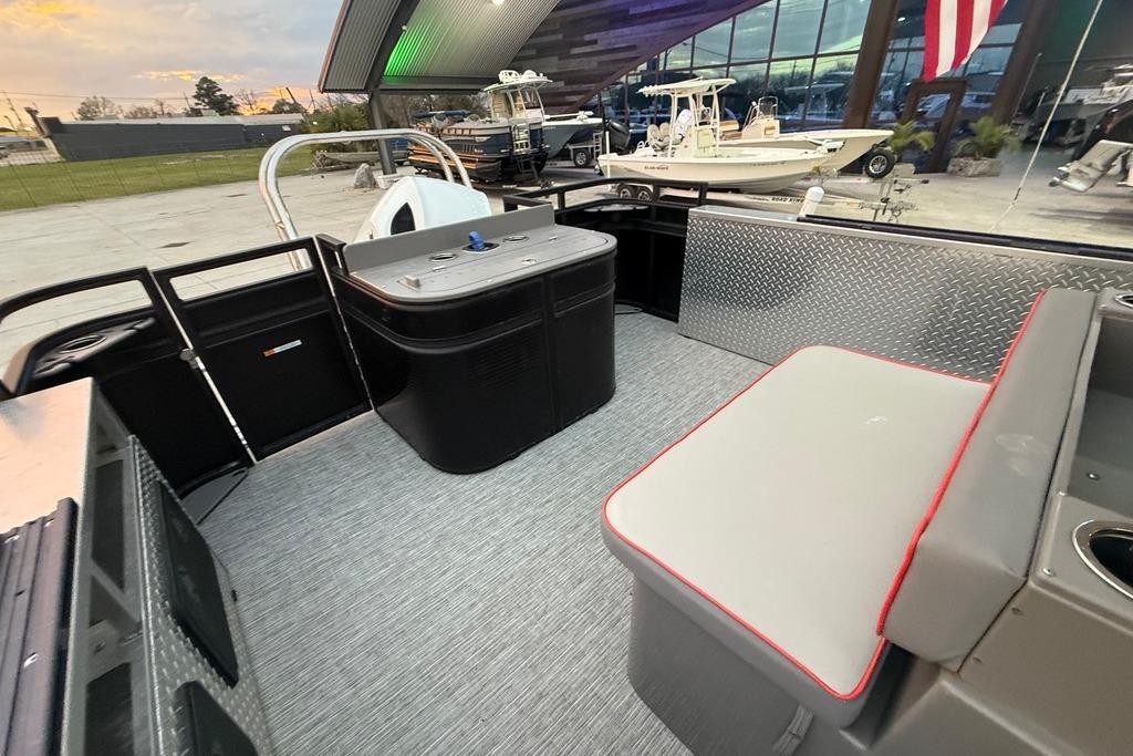 2022 Apex Marine 8524 Pro Fish N Cruise interior with seating and fishing station.