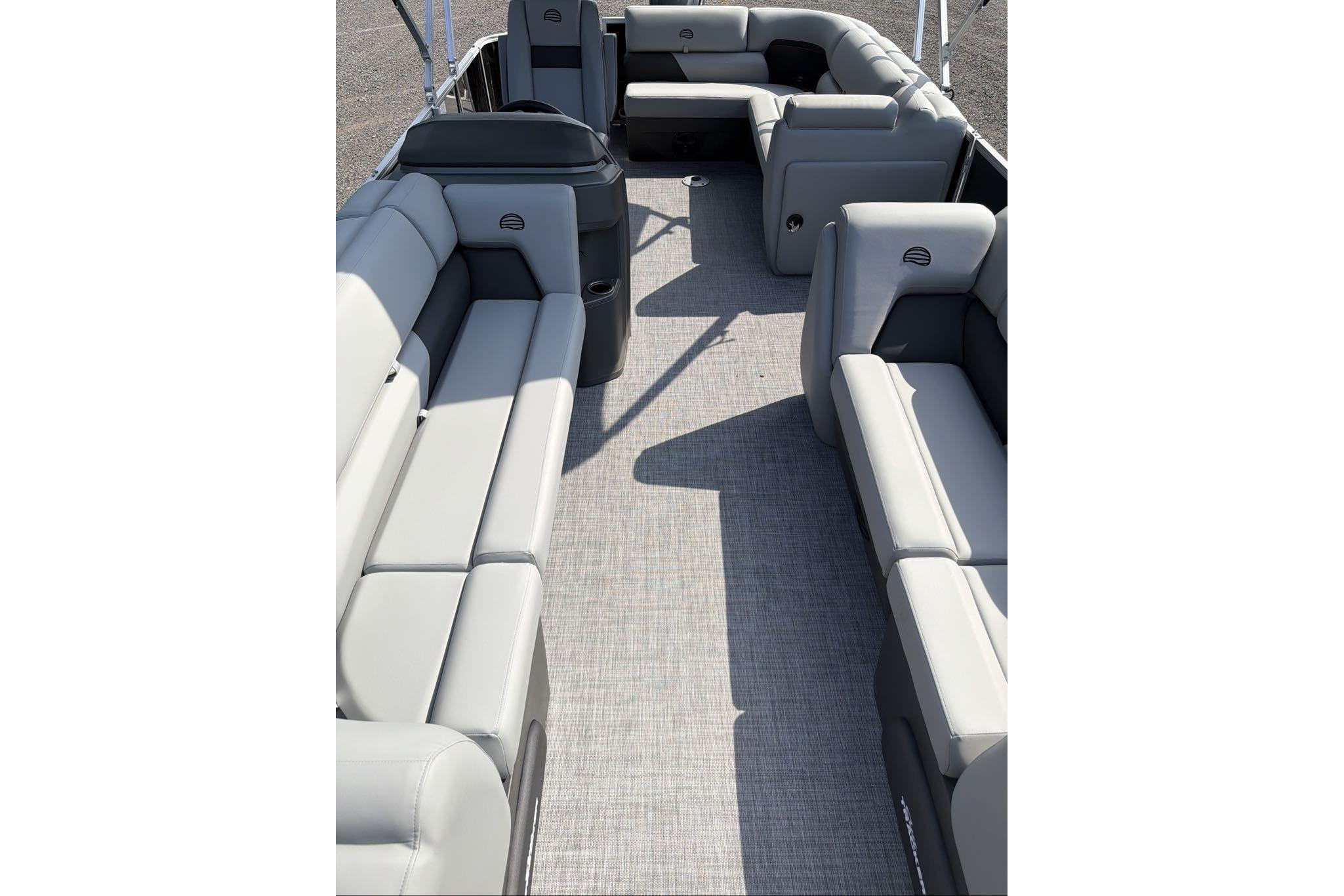 2026 Sun Tracker Party Barge 20 DLX interior with spacious seating and modern design.