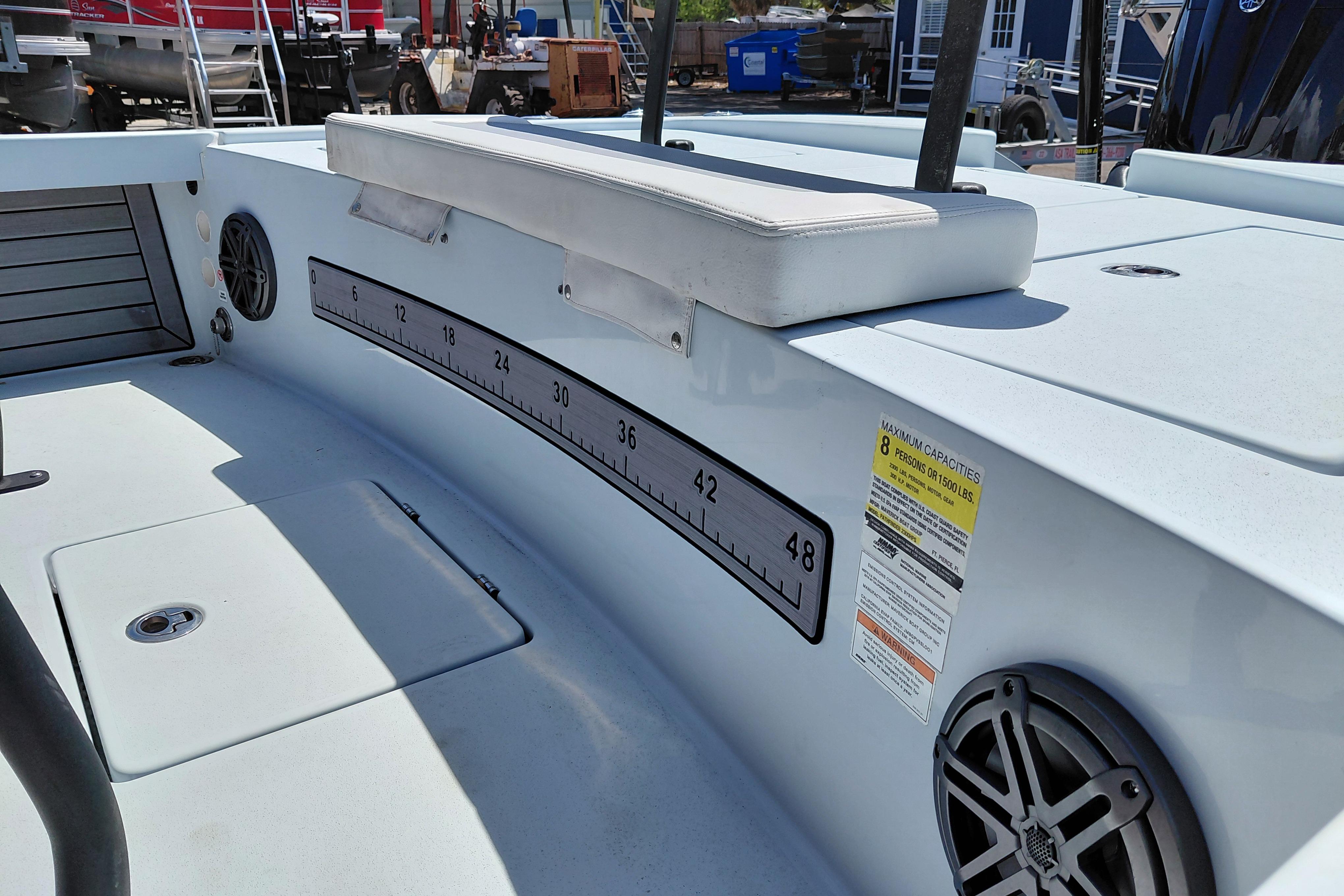 2022 Pathfinder 2300 HPS boat interior with seating, measurement scale, and speaker.