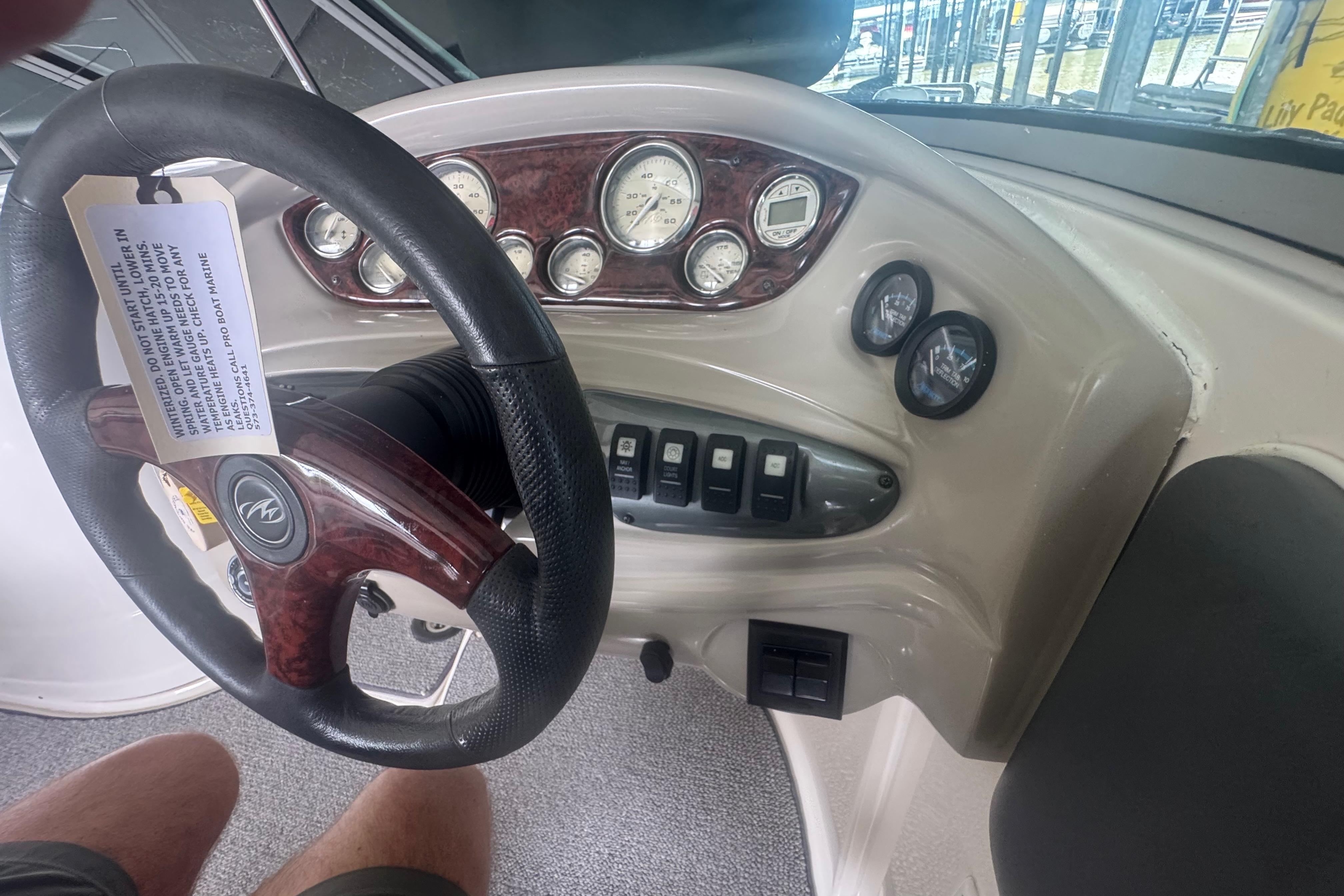 Steering wheel and dashboard of 2005 Monterey 248LS Montura Bowrider boat.