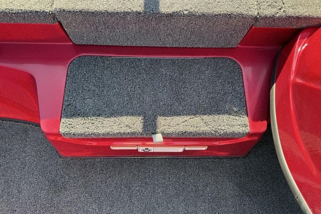 Red and gray carpeted interior of a 2026 Nitro Z17 boat.