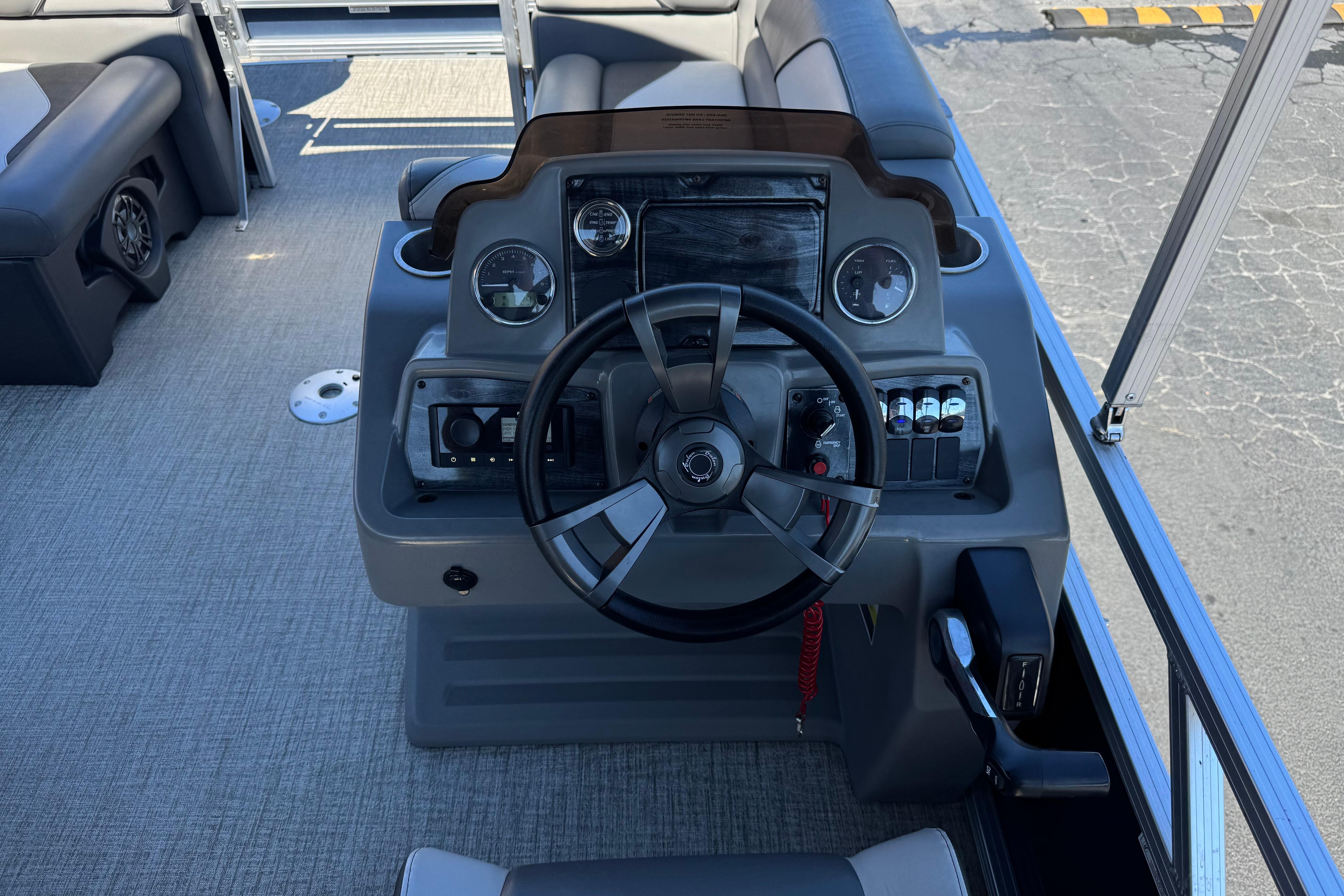 2023 Avalon Venture Fish N Cruise 20' boat dashboard with steering wheel and controls.