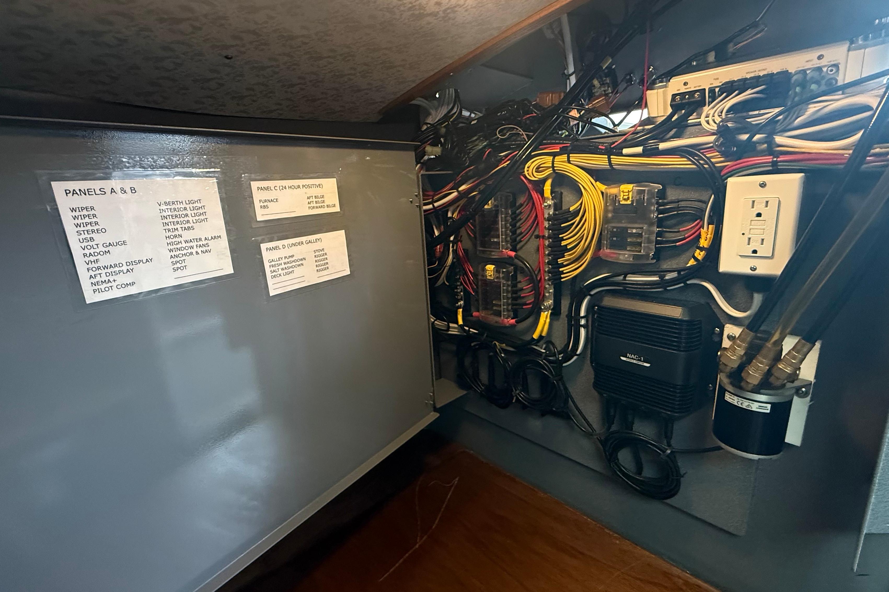 Electrical panel with labeled circuits and wiring in a 2021 Northwest 28 model.