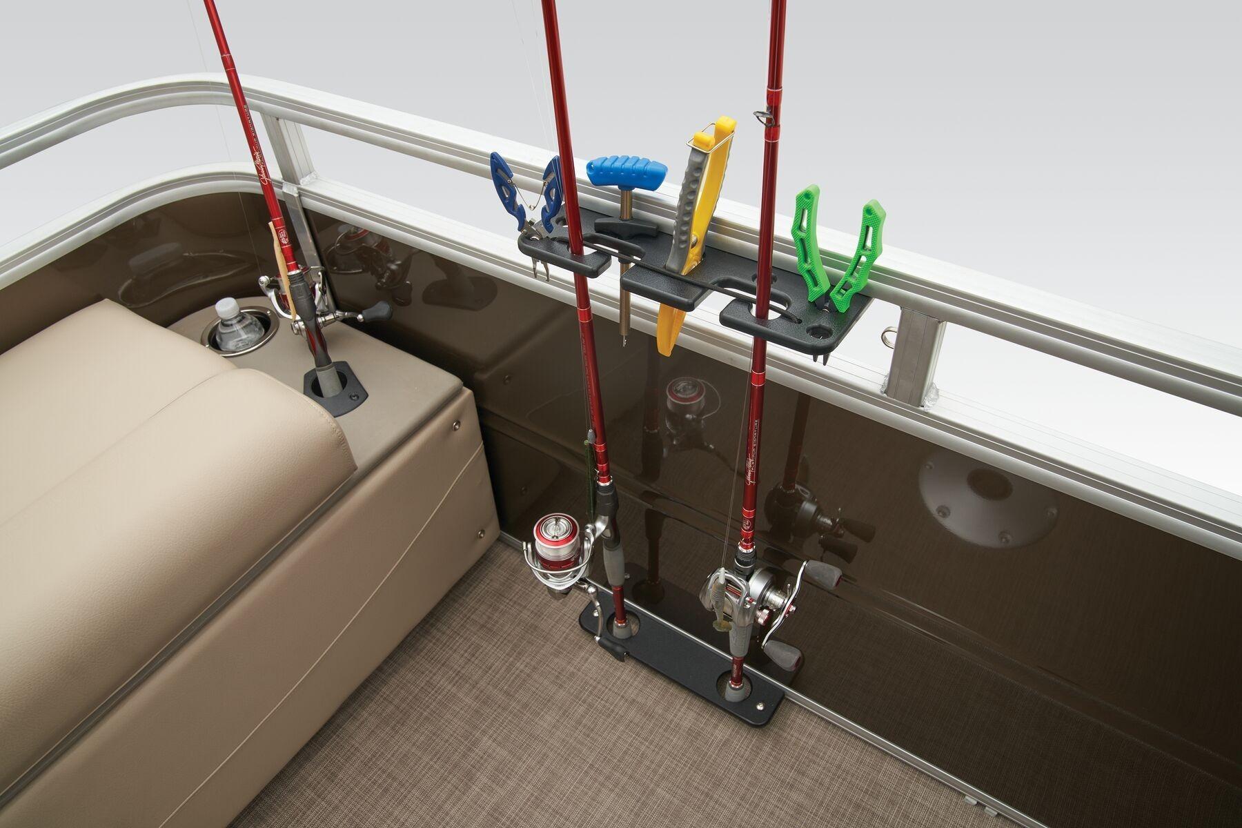2023 Sun Tracker SportFish 22 XP3 fishing rod holders and seating area.