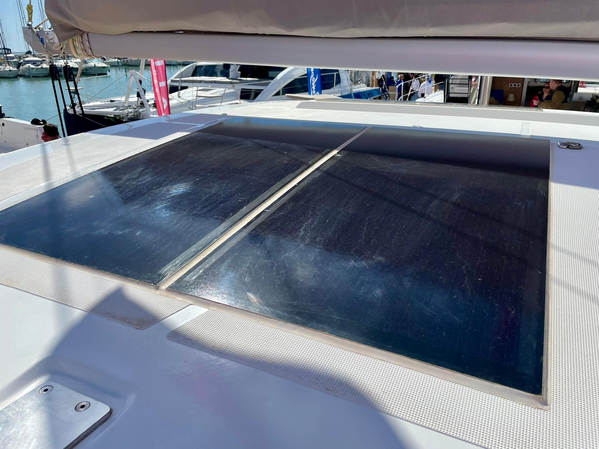 Solar panels on a 2026 Bali CATSMART yacht, docked at a marina.