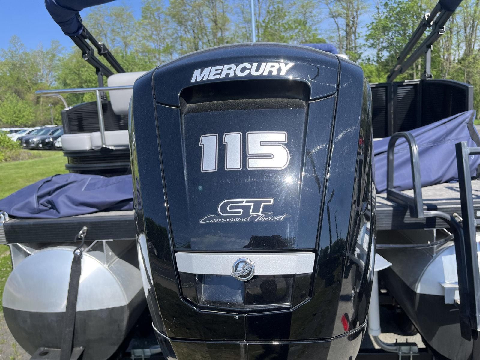 A Mercury 115 GT outboard motor is mounted on a Bennington S20 boat.