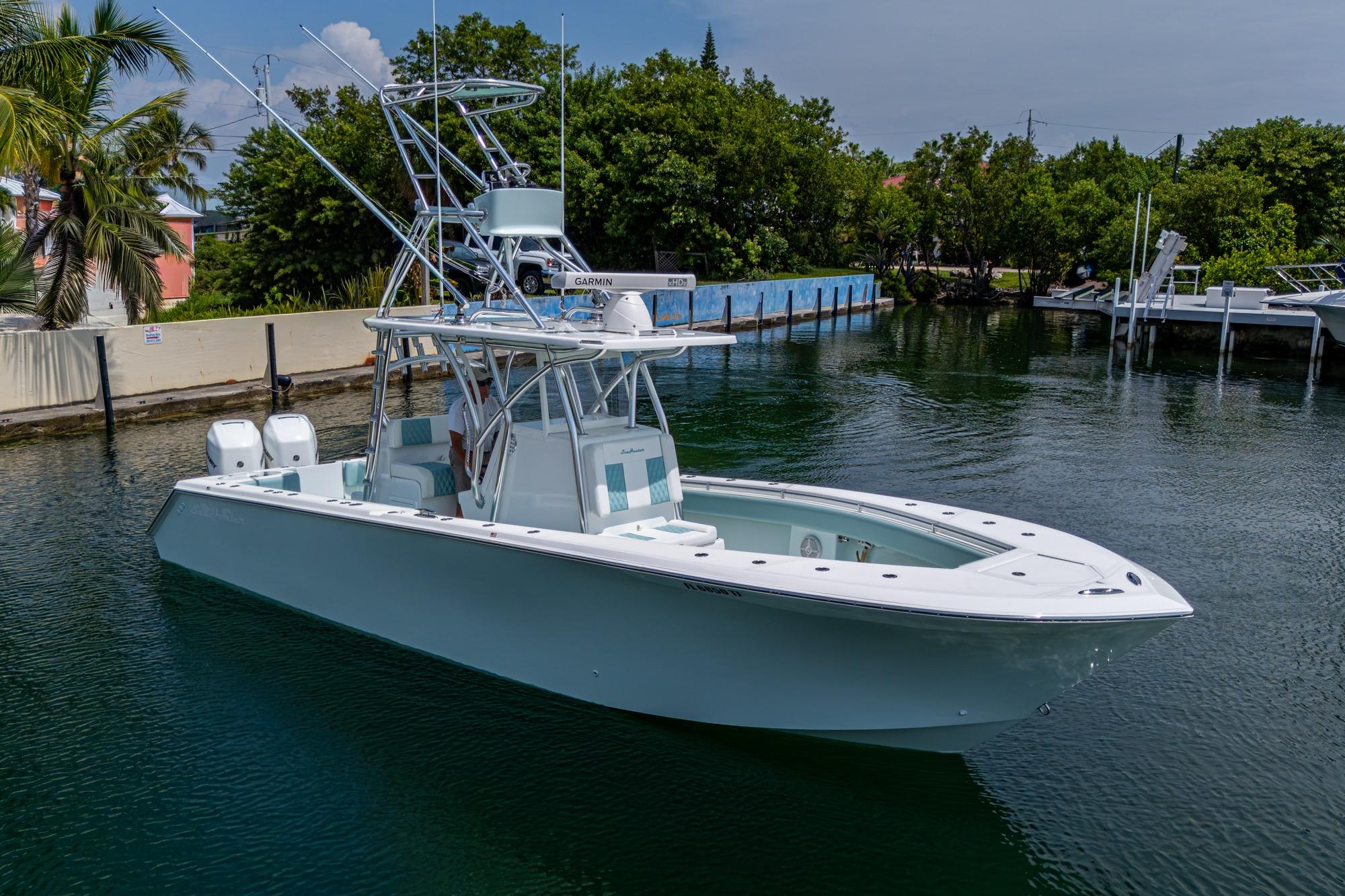 2023 SeaHunter 31 Tournament boat docked in a serene marina setting.