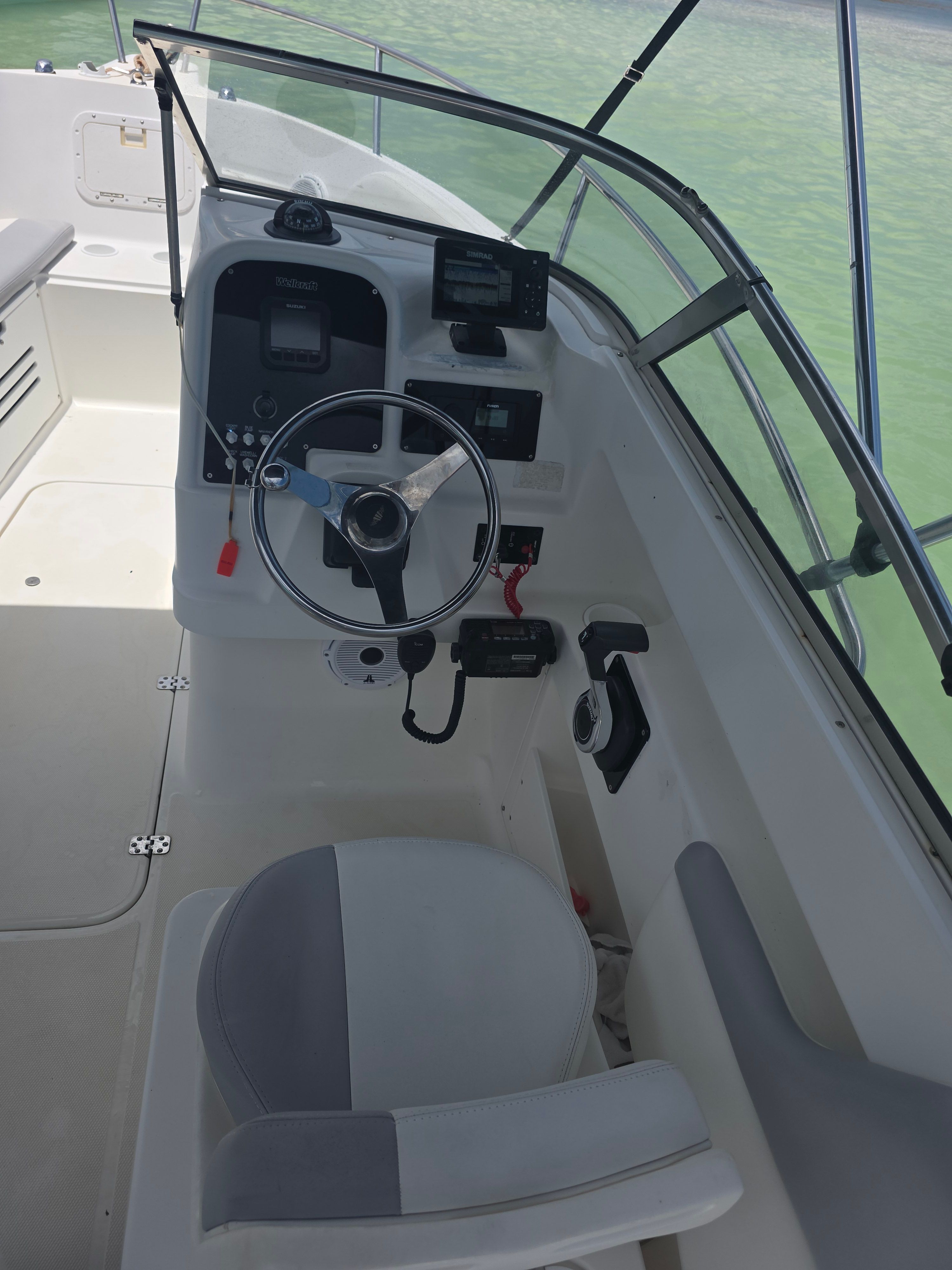 Interior view of a 2001 Wellcraft Sportsman boat with steering console.