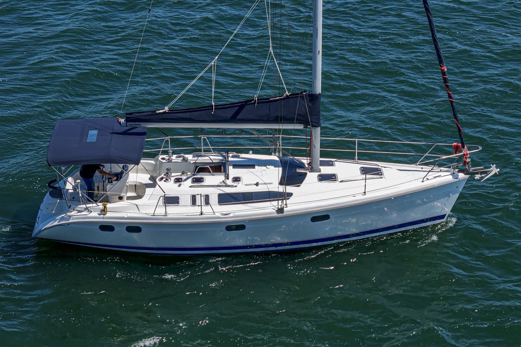 Sailboat Hunter 376, 1996 model, cruising on open water.