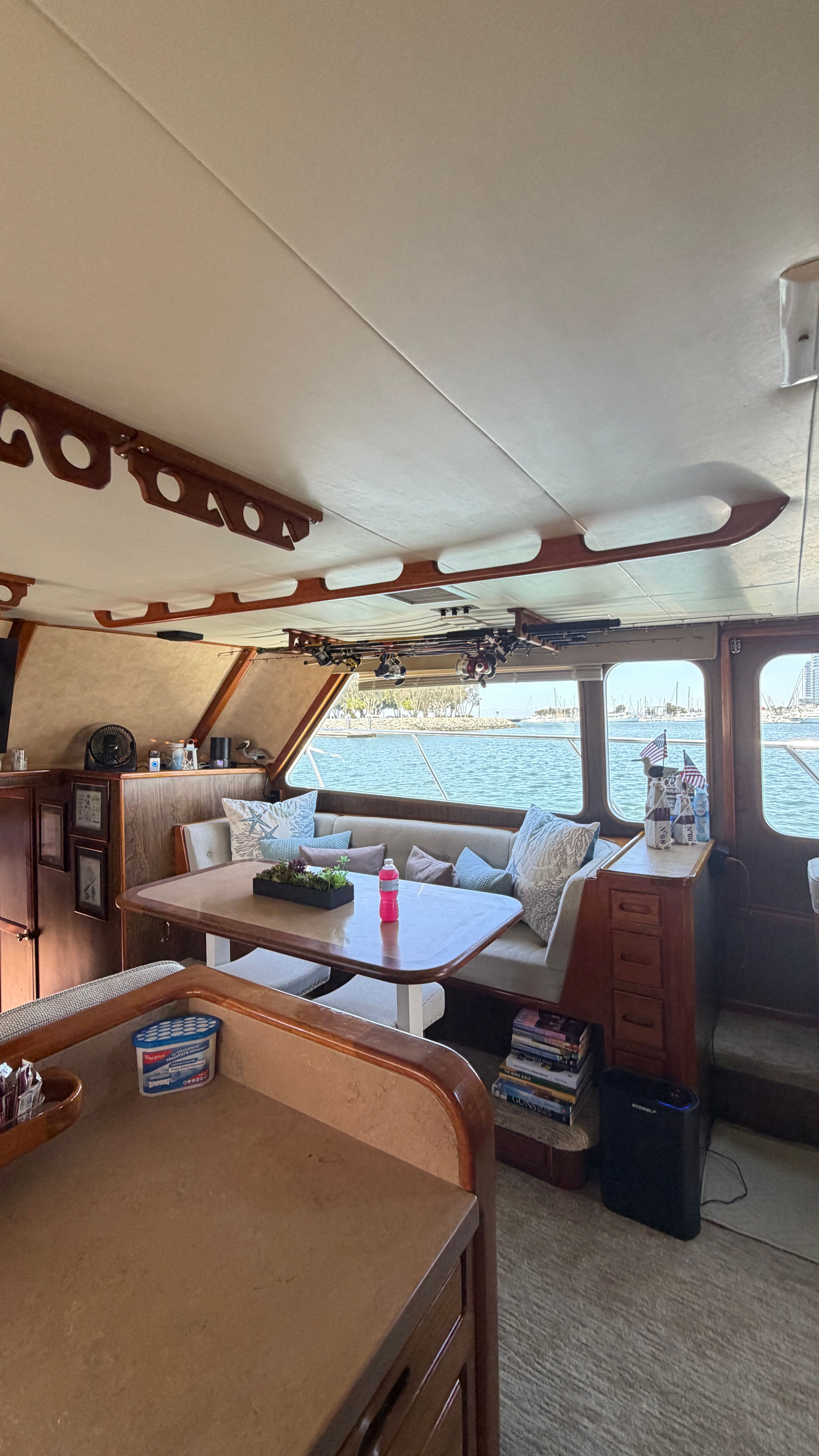 Interior of a 1966 Drake Yachtfisher with cozy seating area.