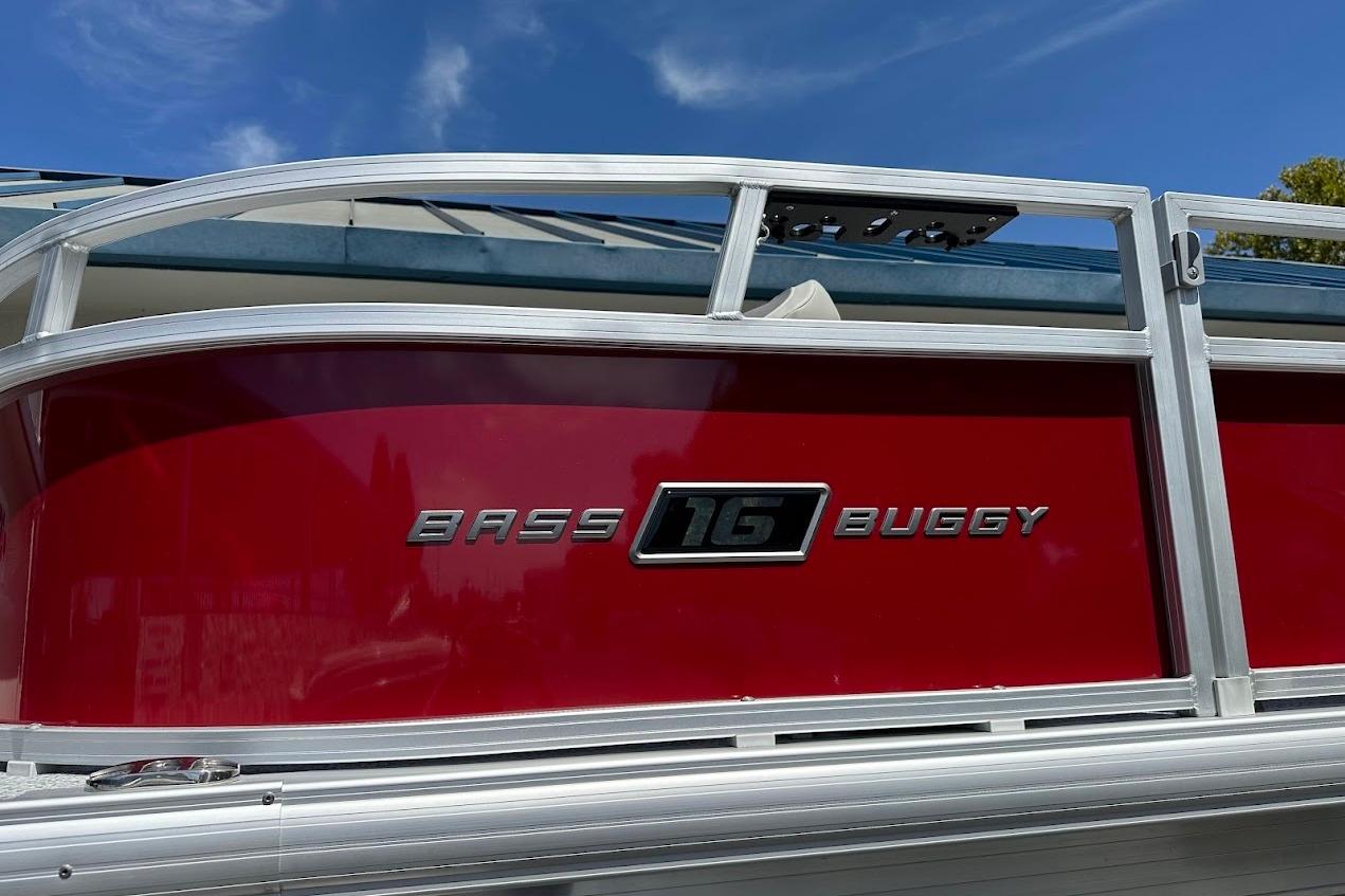 2026 Sun Tracker Bass Buggy 16 XL Select pontoon boat, red exterior detail.