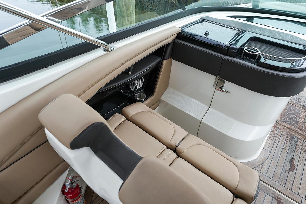 2018 Sea Ray SLX 350 interior with tan seating and sleek design.