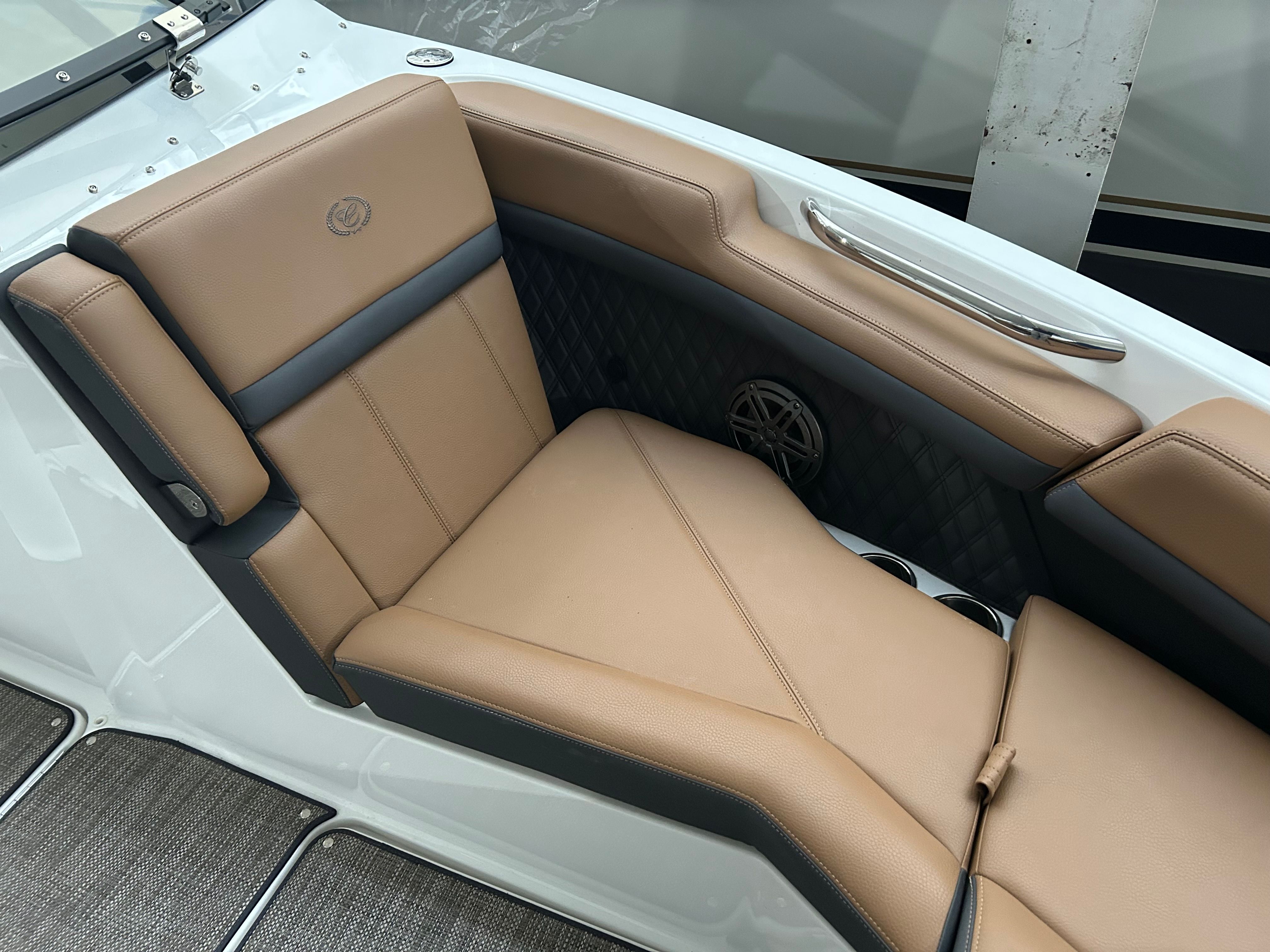 Luxurious seating in 2024 Cobalt R6 boat, brown leather.