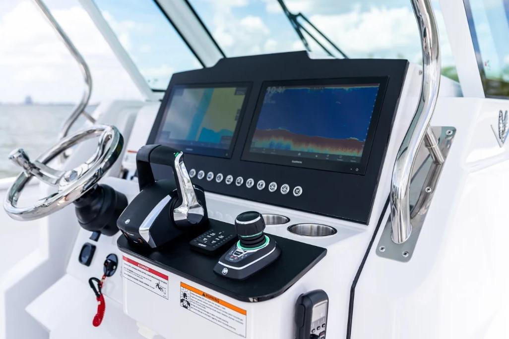 Manufacturer Provided Image: Helm of 2026 Bertram 34 CC with dual screens and modern controls.
