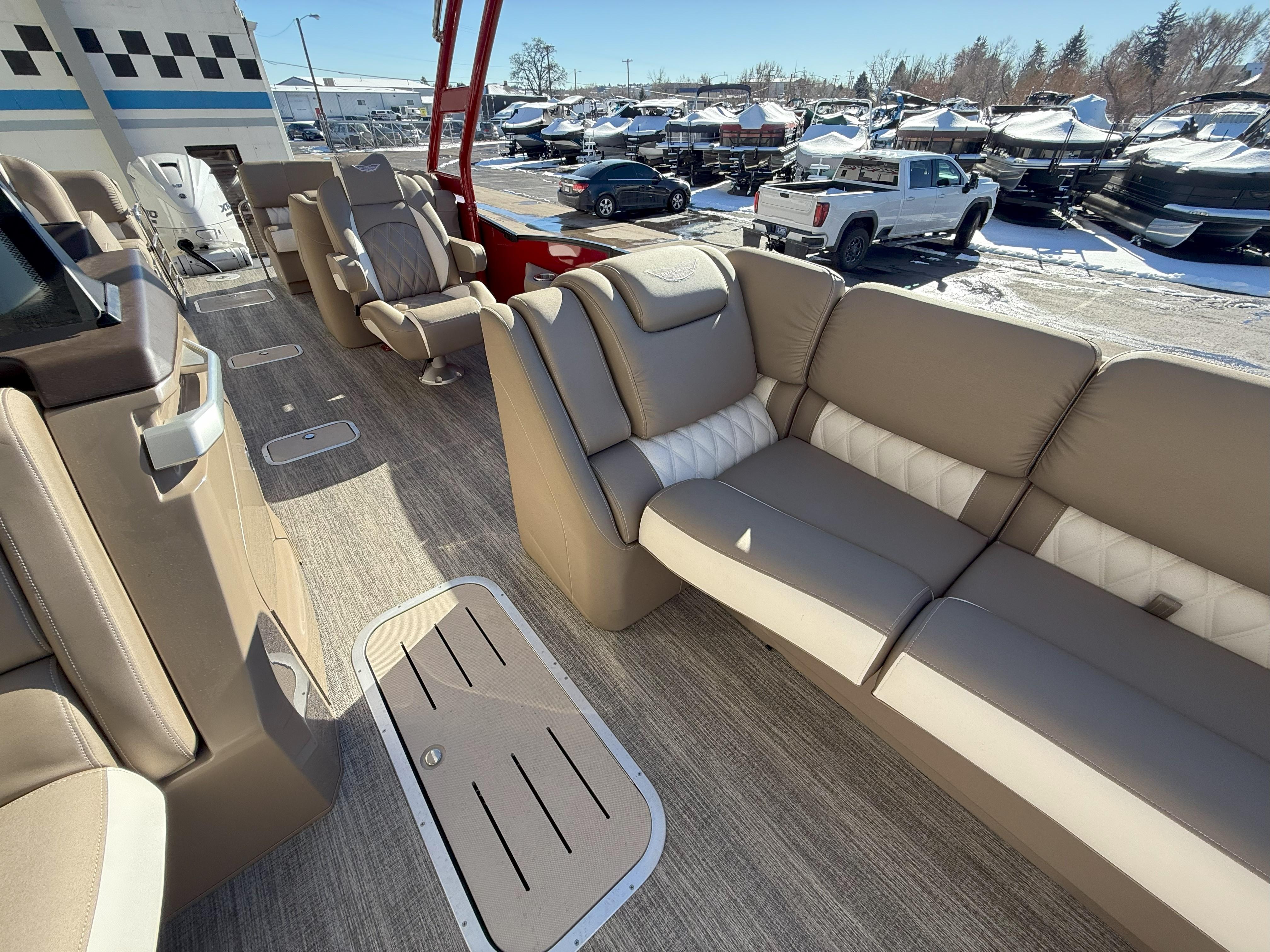 2025 Bennington 25QXFB boat interior with luxurious seating and modern design.
