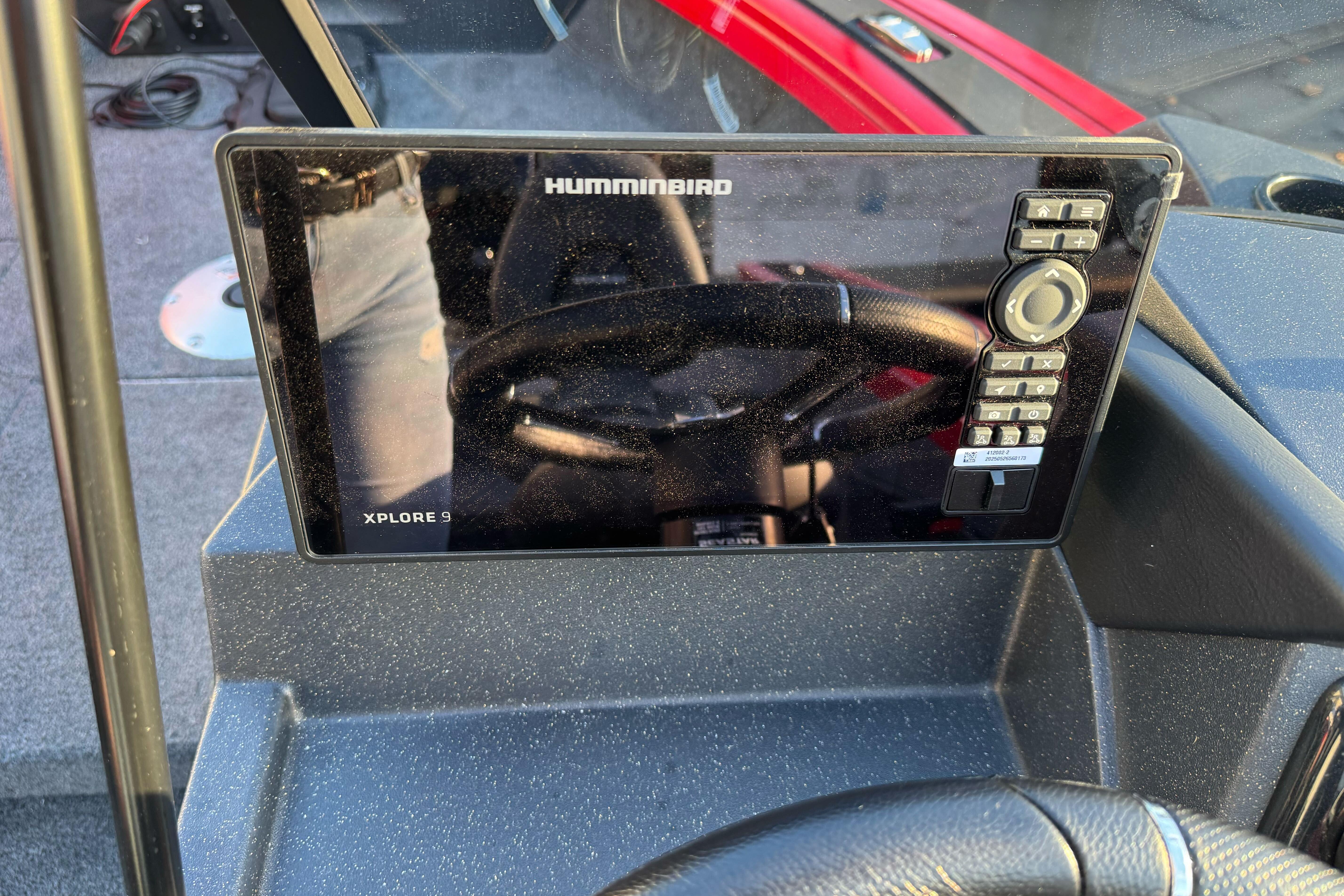 Humminbird Xplore 9 fishfinder on 2026 Tracker Targa V-18 WT boat dashboard.