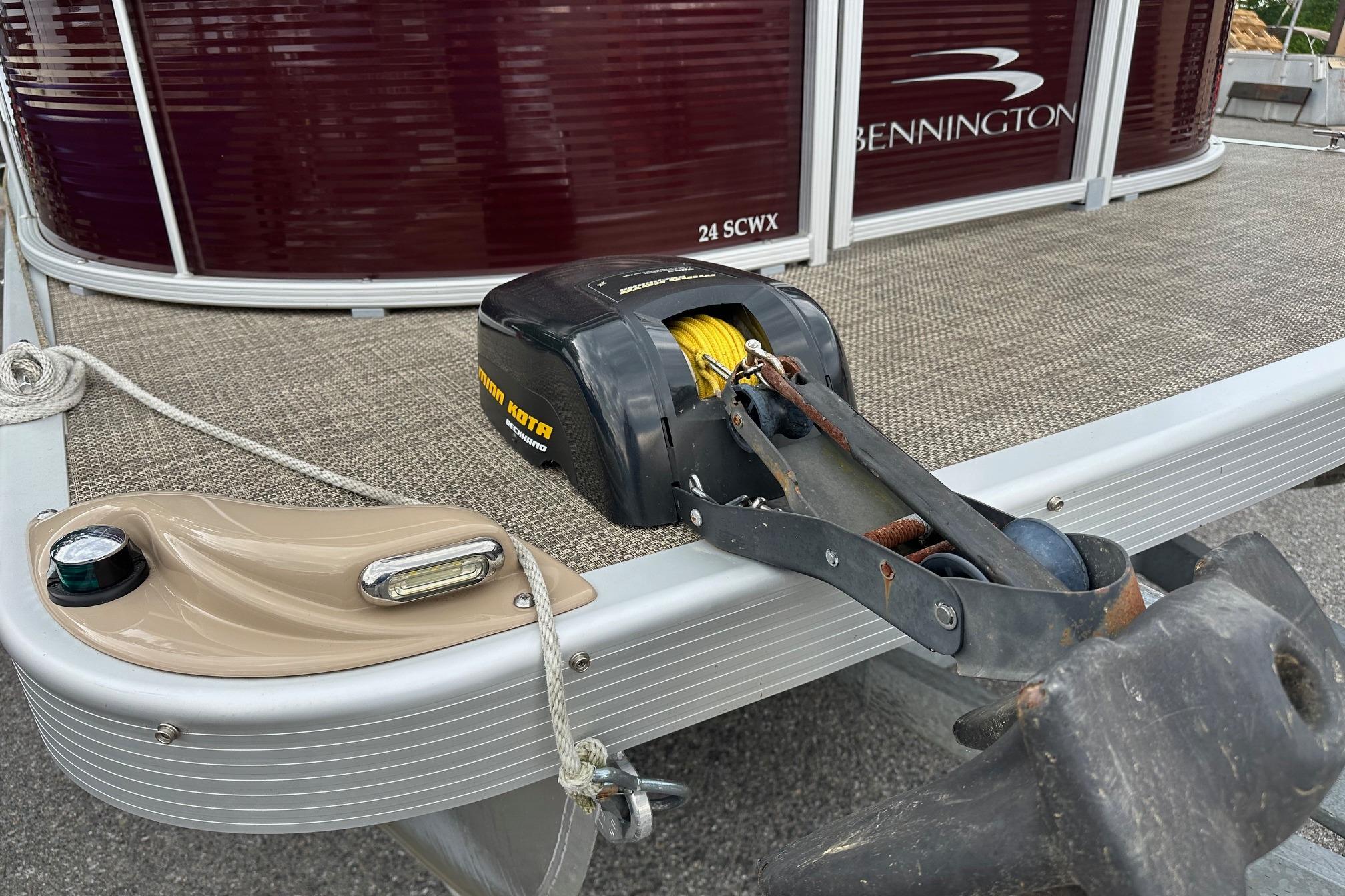 2016 Bennington 24 SCWX pontoon boat with Minn Kota anchor winch on deck.