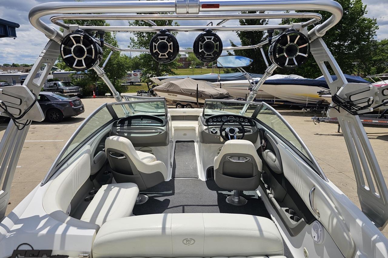 2010 Cobalt 232 WSS boat interior with sleek seating and advanced audio system.