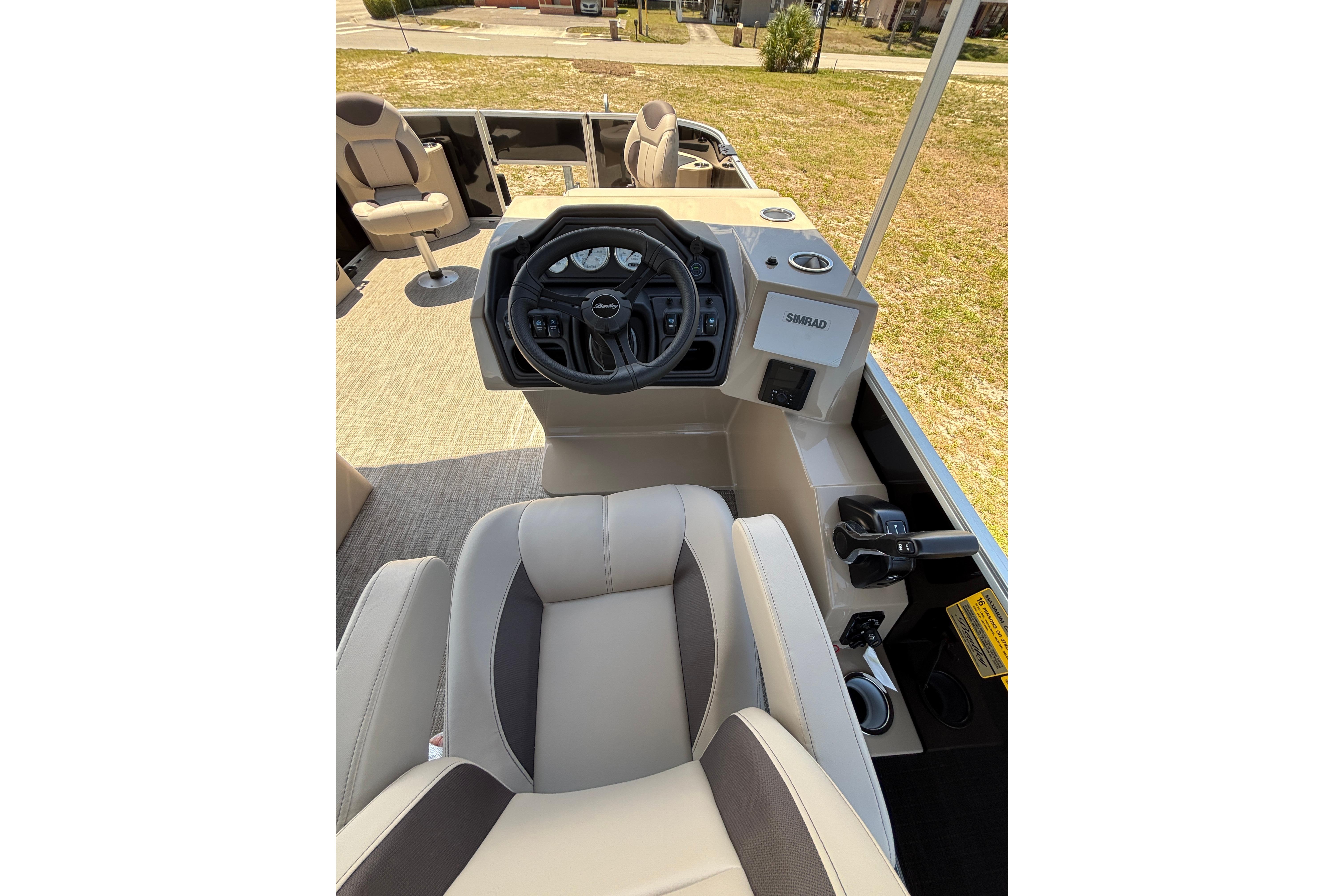 Interior of 2026 Bentley Pontoons Fish 243 4-Point with steering console.