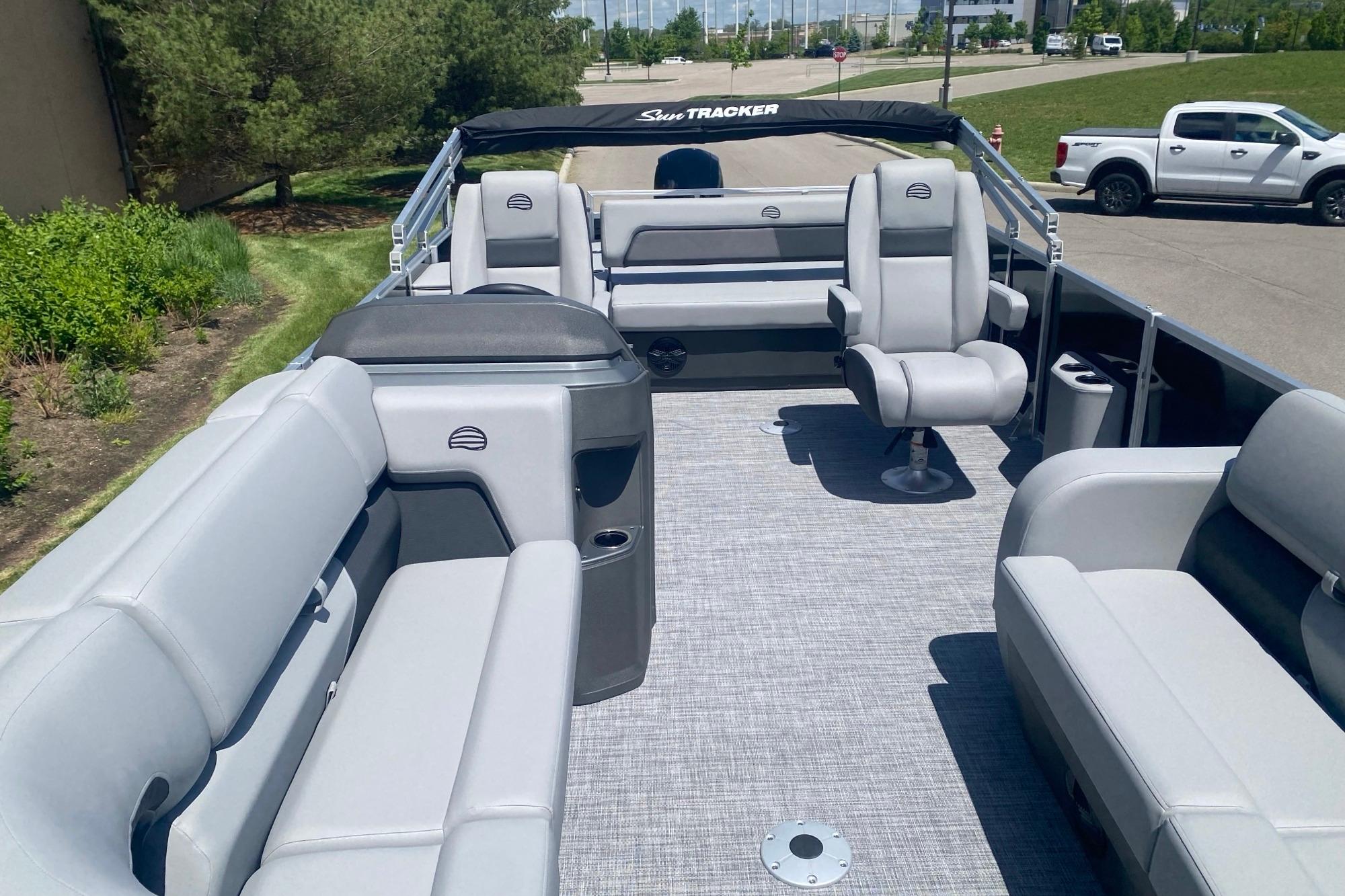 2026 Sun Tracker Party Barge 22 RF DLX pontoon boat with spacious seating and modern design.