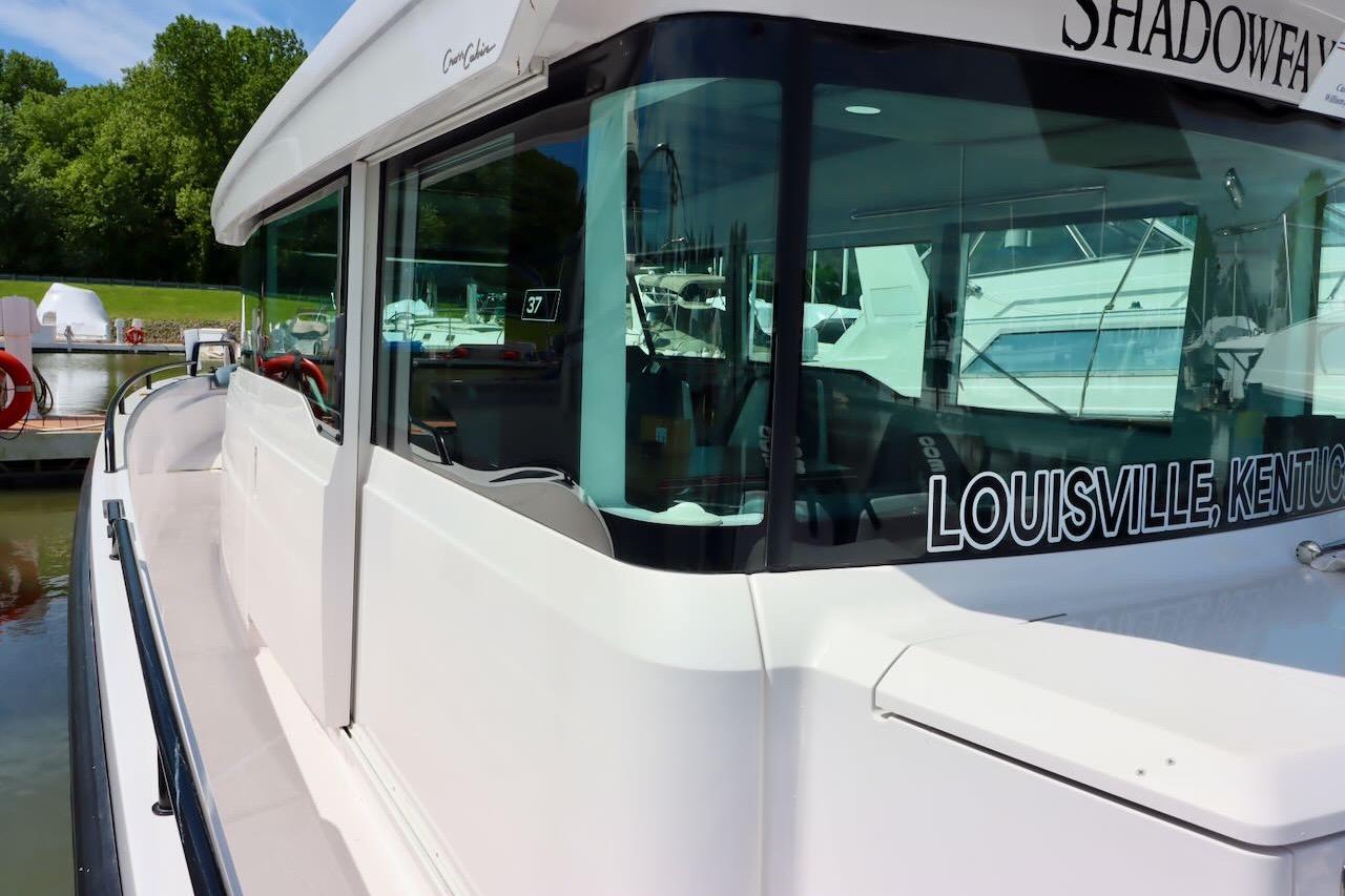 2022 Axopar 37 XC Cross Cabin boat docked in Louisville, Kentucky marina.