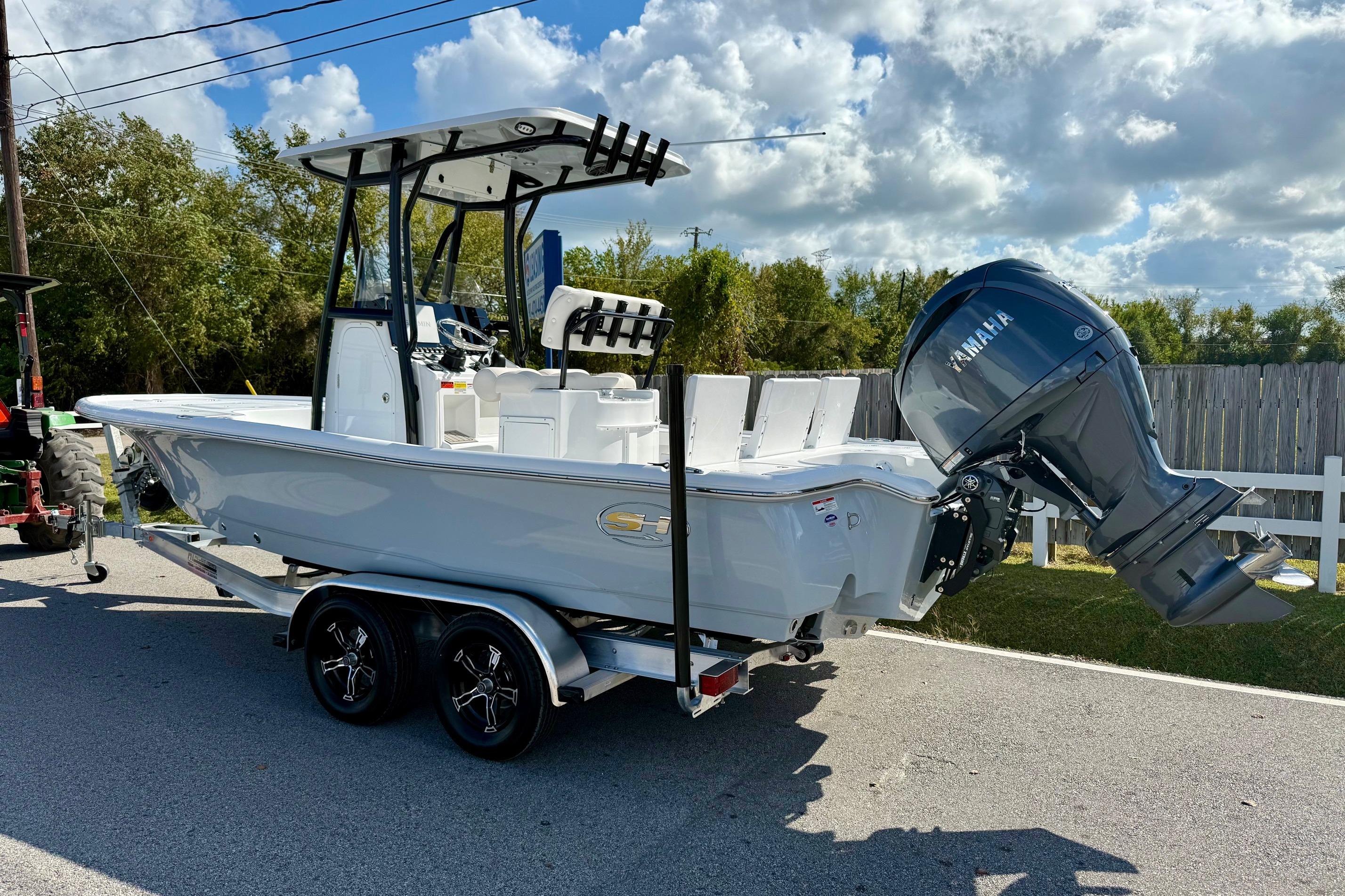 2026 Sea Hunt BX 22 BR boat on trailer with Yamaha outboard motor.