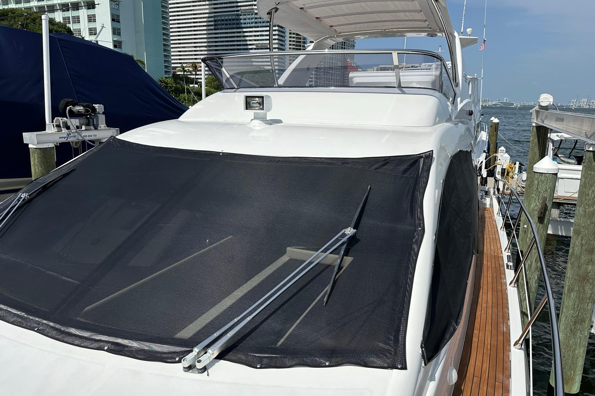 2013 Azimut Fly 53 yacht docked, featuring sleek design and spacious deck.