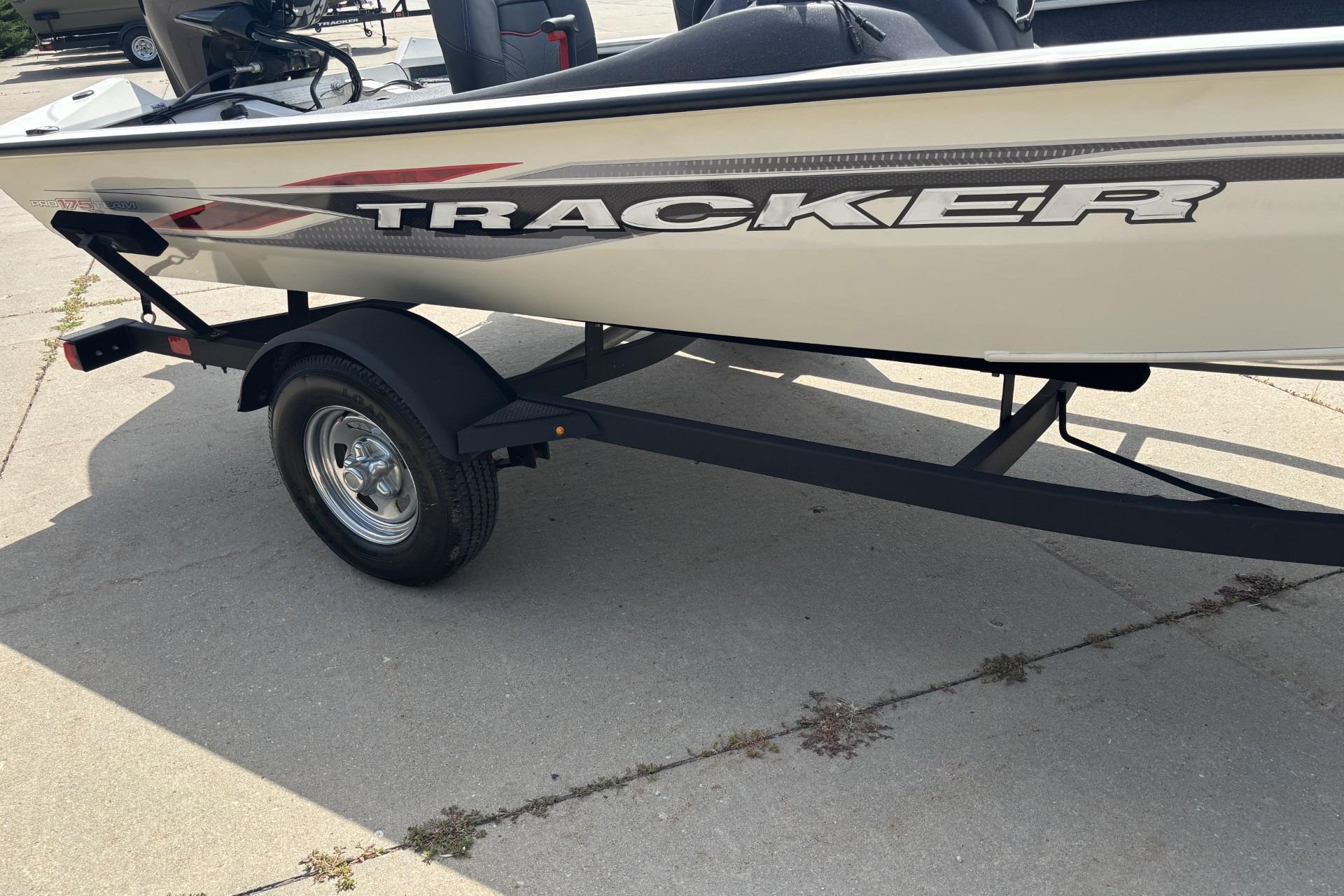2024 Tracker Pro Team 175 TF boat on trailer, side view.