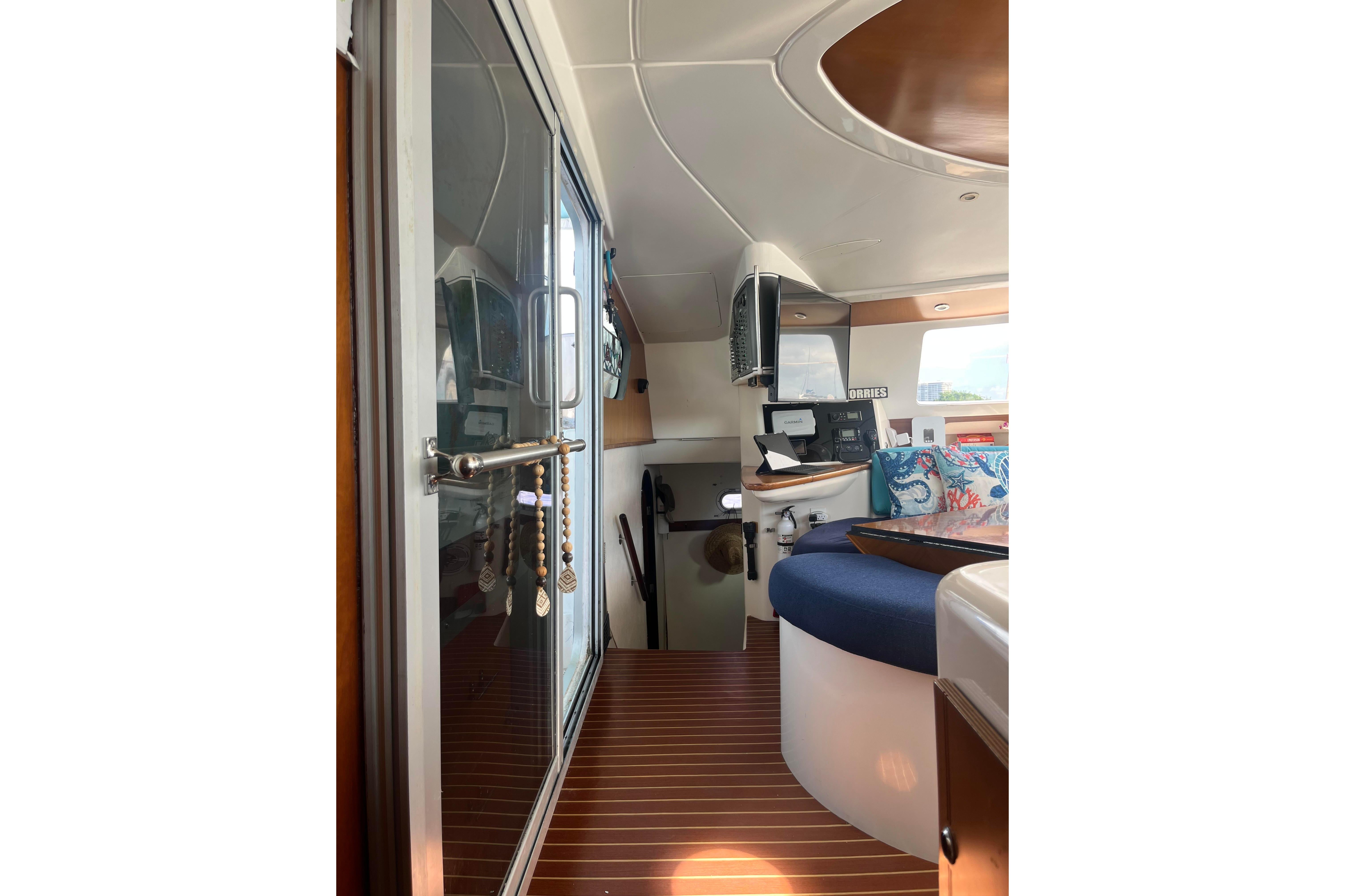 Interior of 2000 Fountaine Pajot Belize 43 catamaran with modern design and nautical decor.