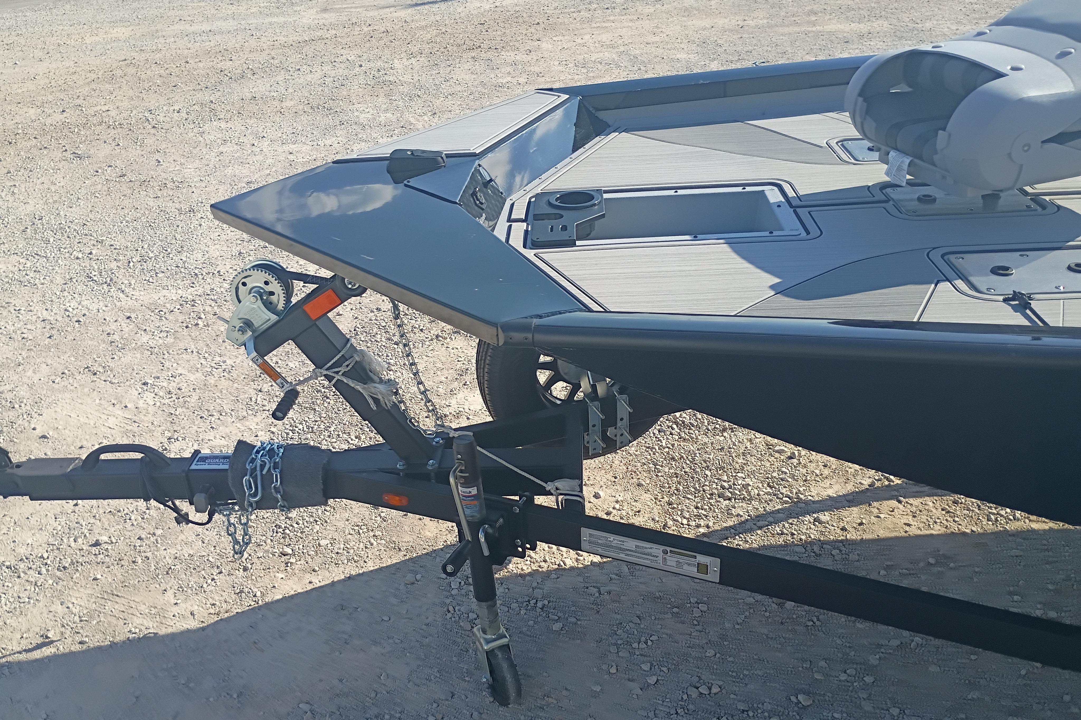 2026 G3 1810SE boat on trailer, parked on gravel surface.