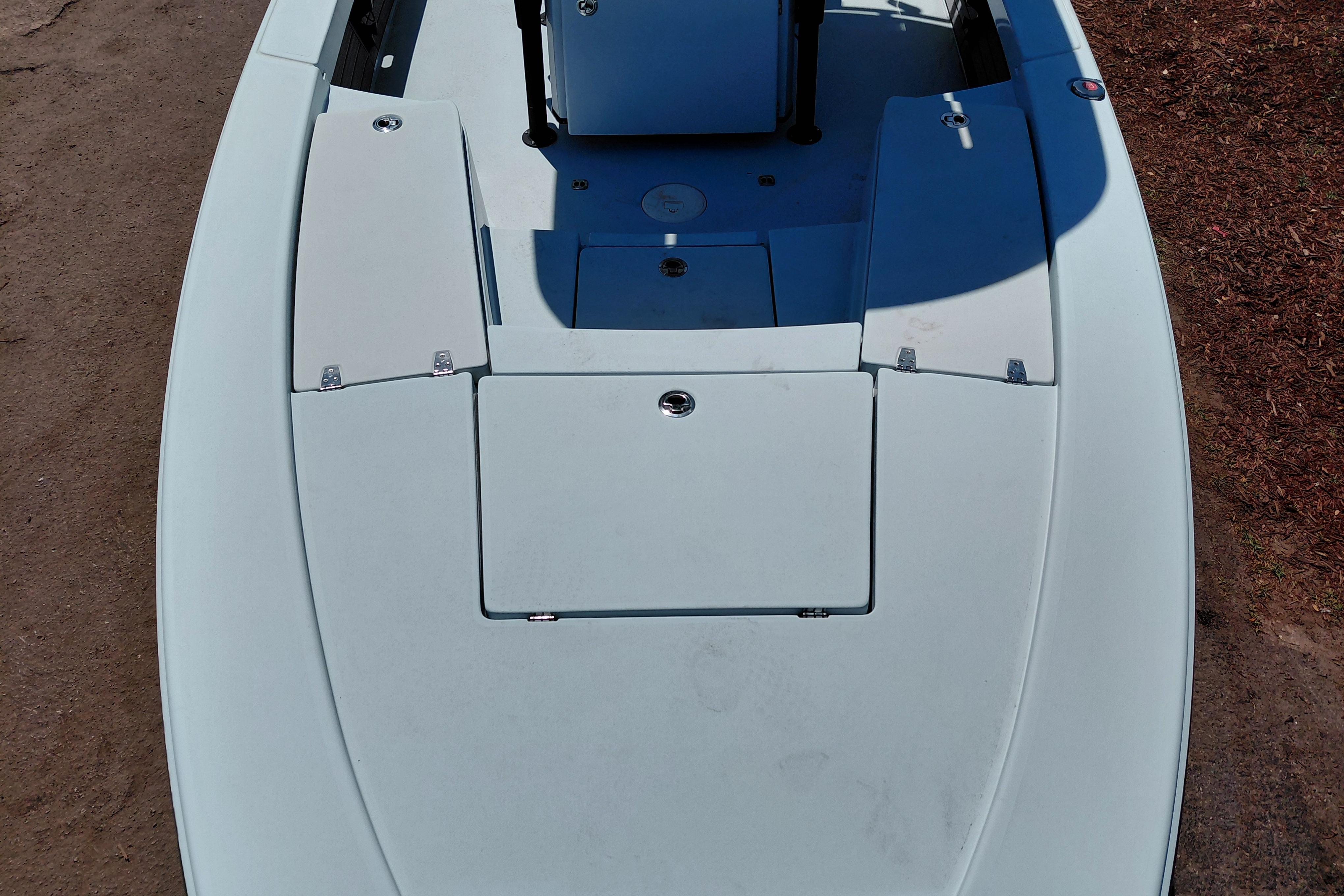 2022 Pathfinder 2300 HPS boat deck, featuring storage compartments and sleek design.