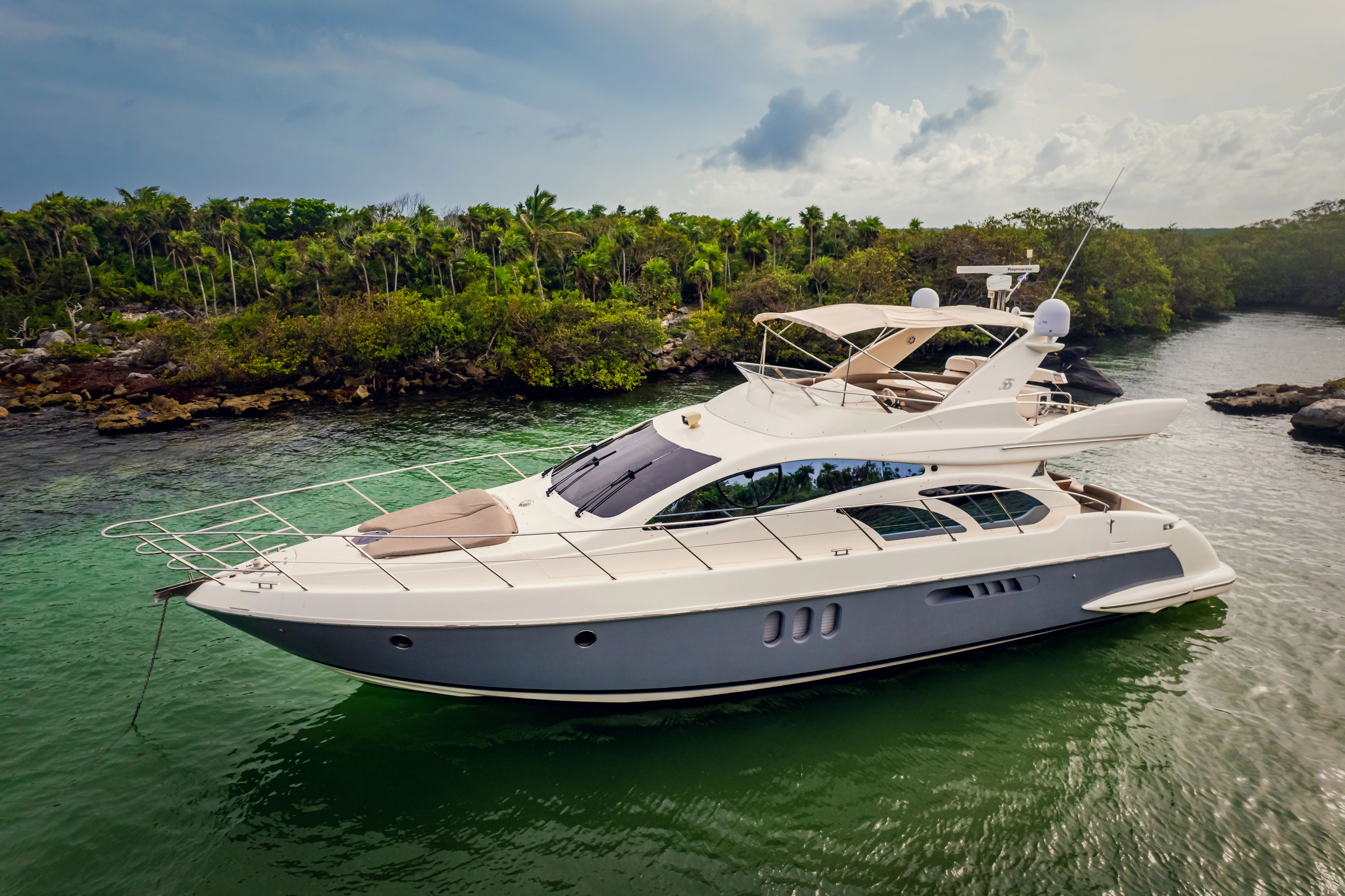 2004 Azimut 55E Yacht in tropical lagoon.