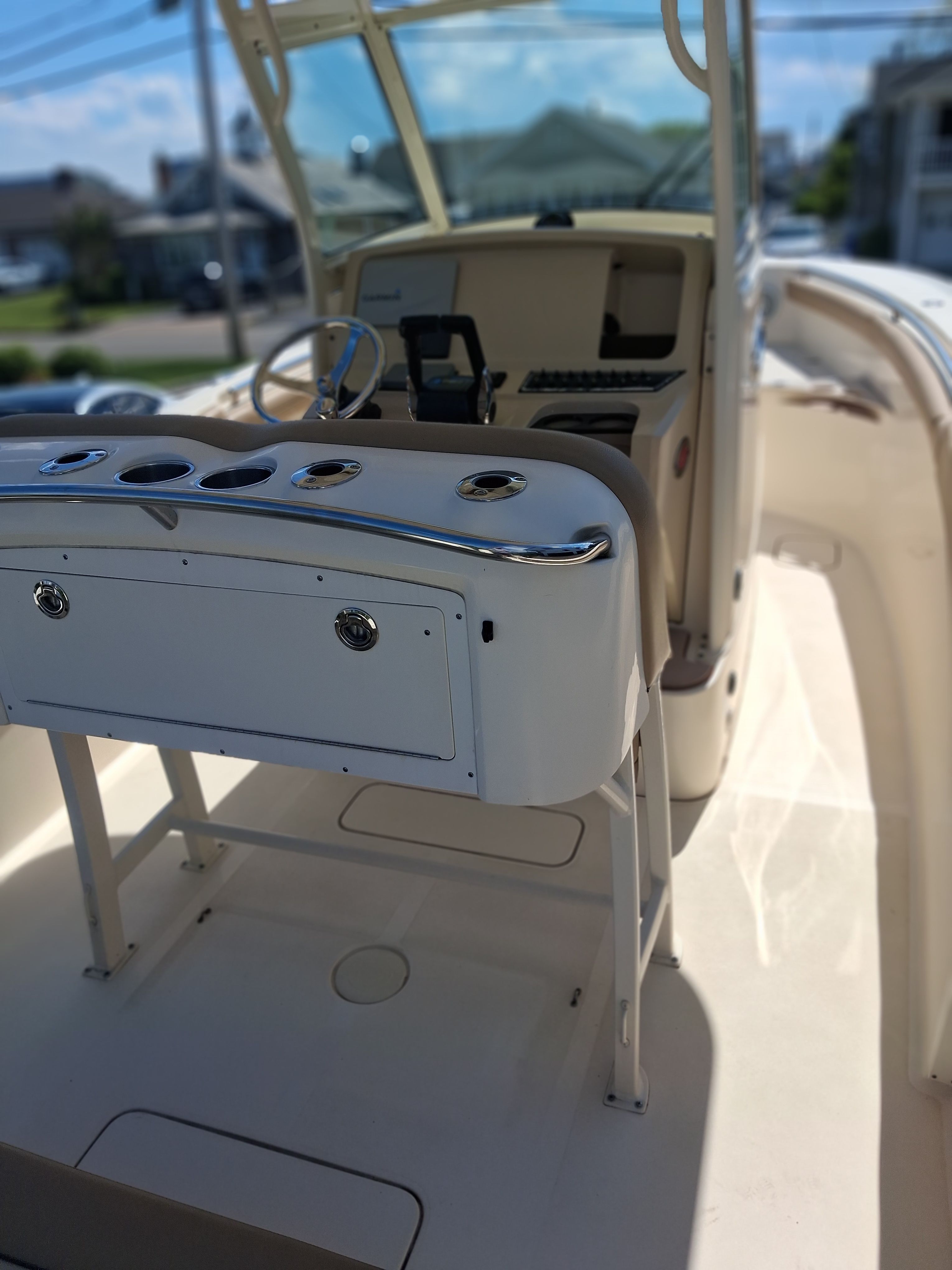 Interior view of a 2018 Scout 255LXF boat with helm console.