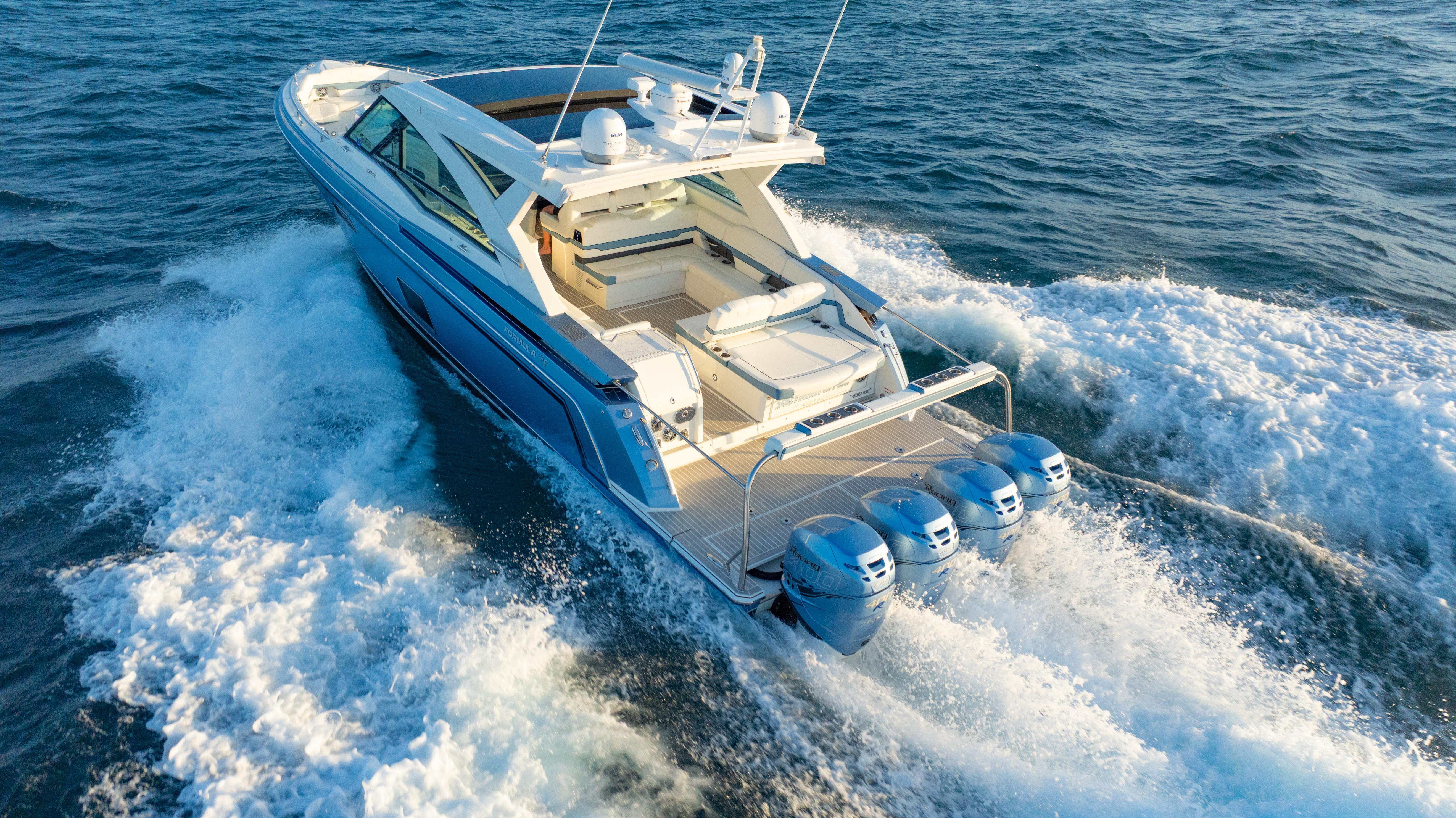 2018 Formula 430 Super Sport Crossover cruising on open water, showcasing powerful engines.