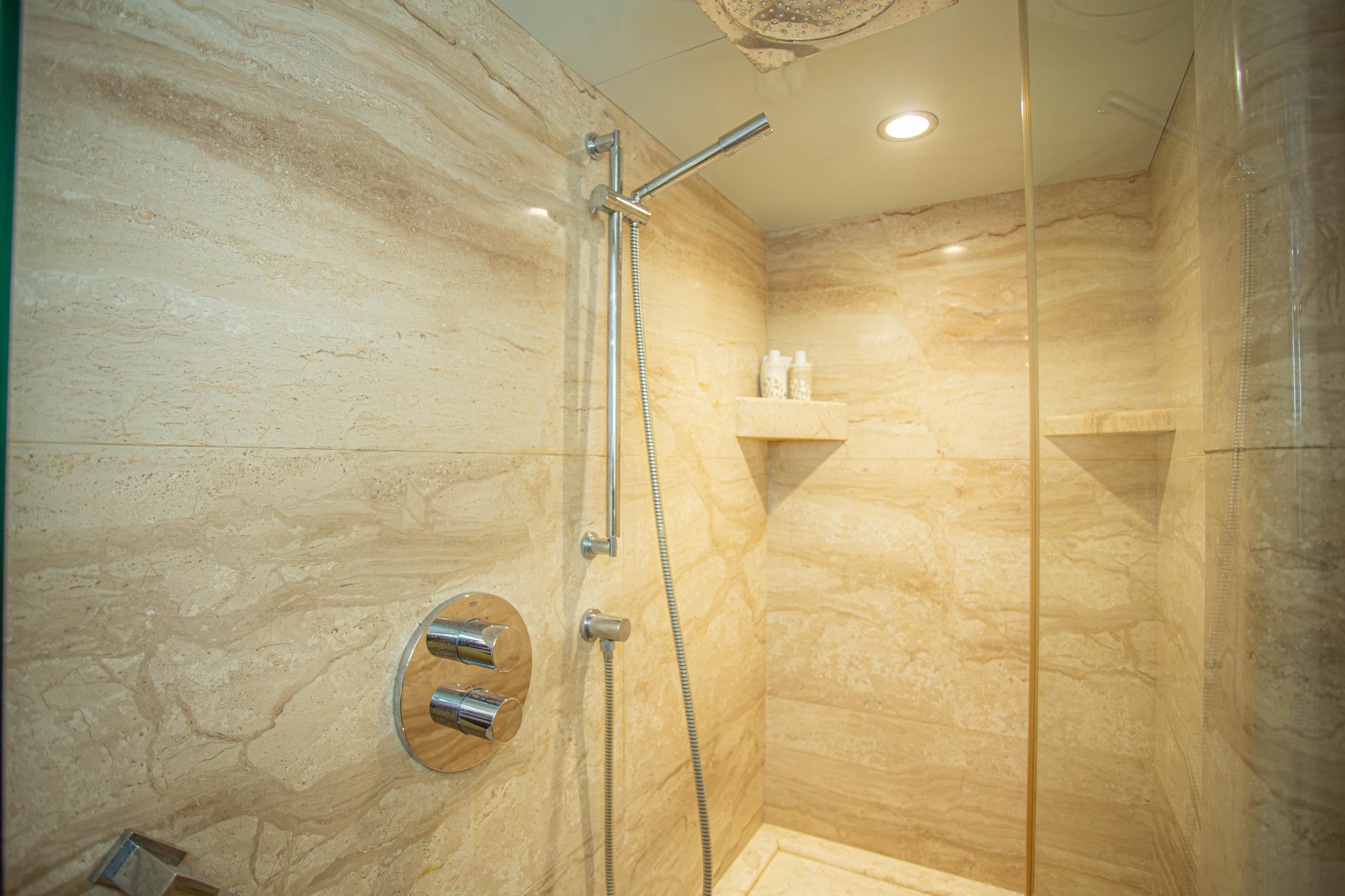 Luxurious marble shower in 2014 Fifth Ocean Yachts 24m Explorer Yacht.