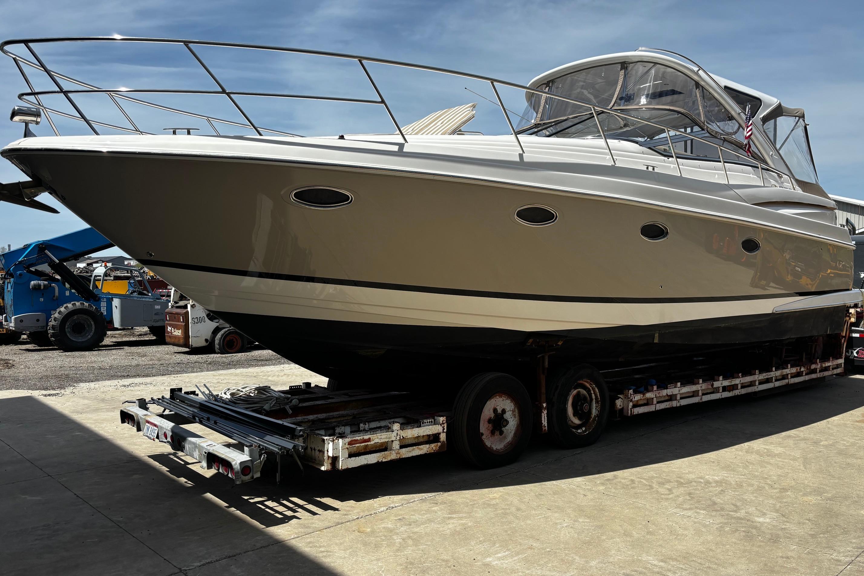 2006 Regal Commodore 3860 yacht on trailer, ready for transport.
