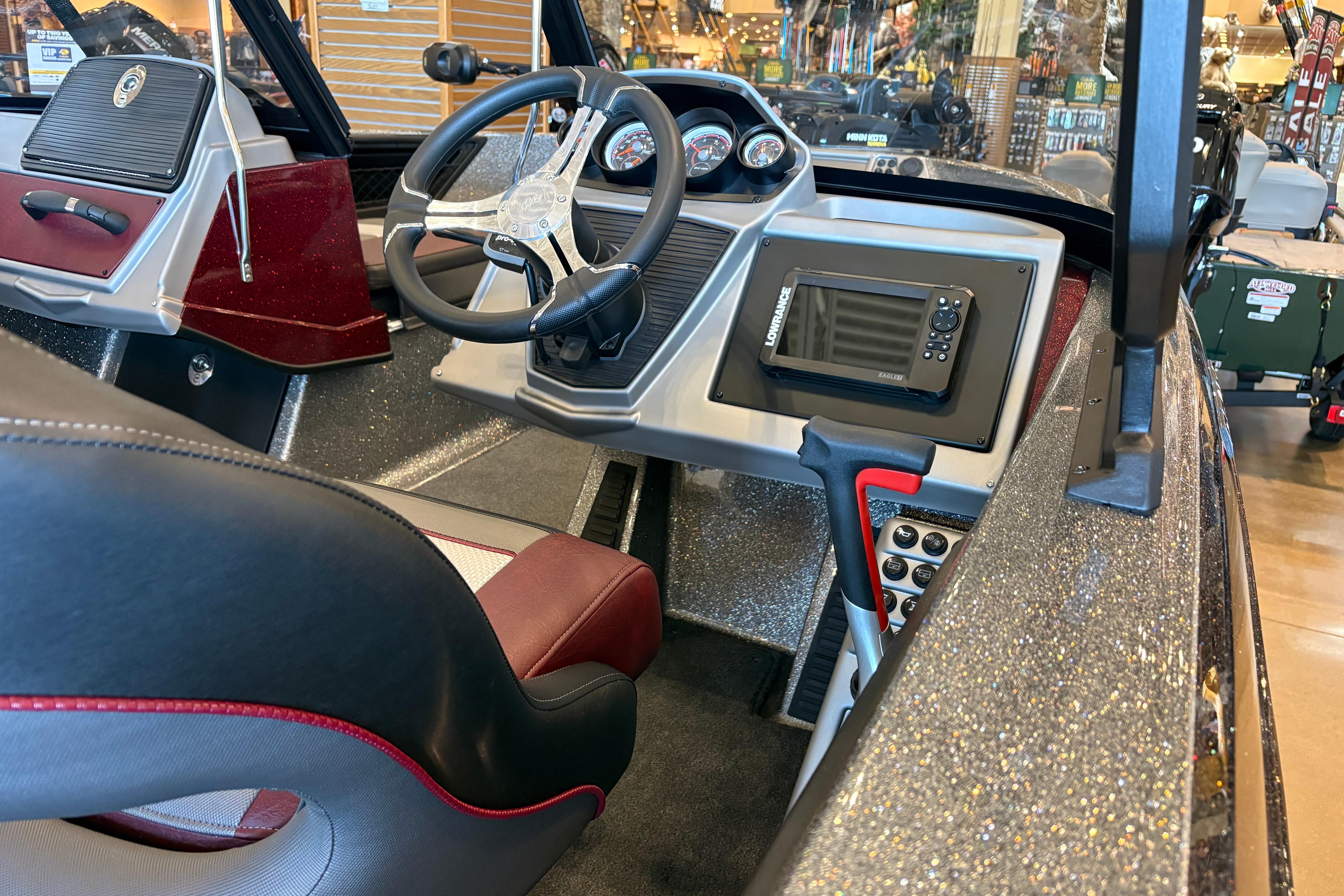Interior of a 2026 Ranger 1850MS boat featuring steering wheel and control panel.