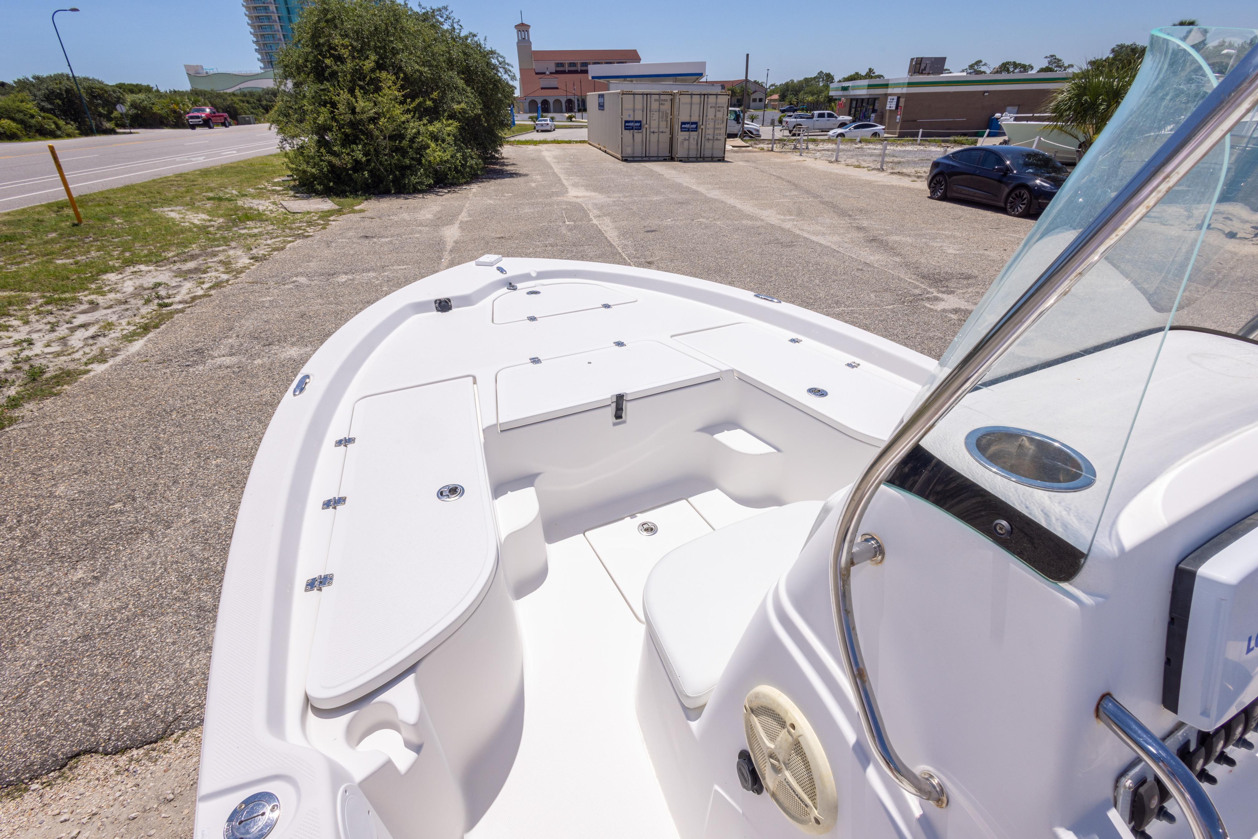 2011 Sea Fox 200XT boat interior, parked on a sunny day near a road.