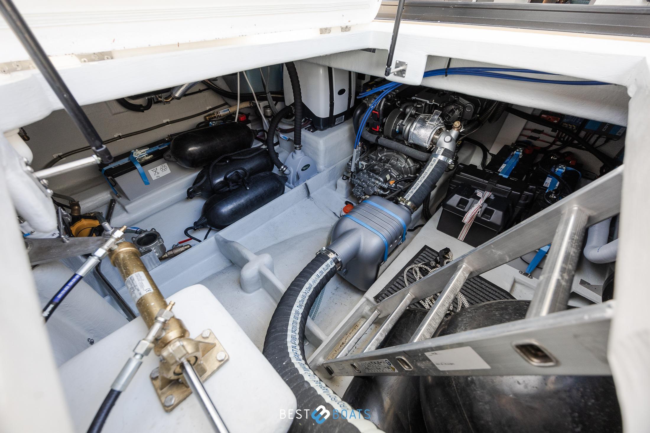 Engine compartment of 2023 Cobra Yachts Futura 36 Premium Fly, showcasing mechanical components.