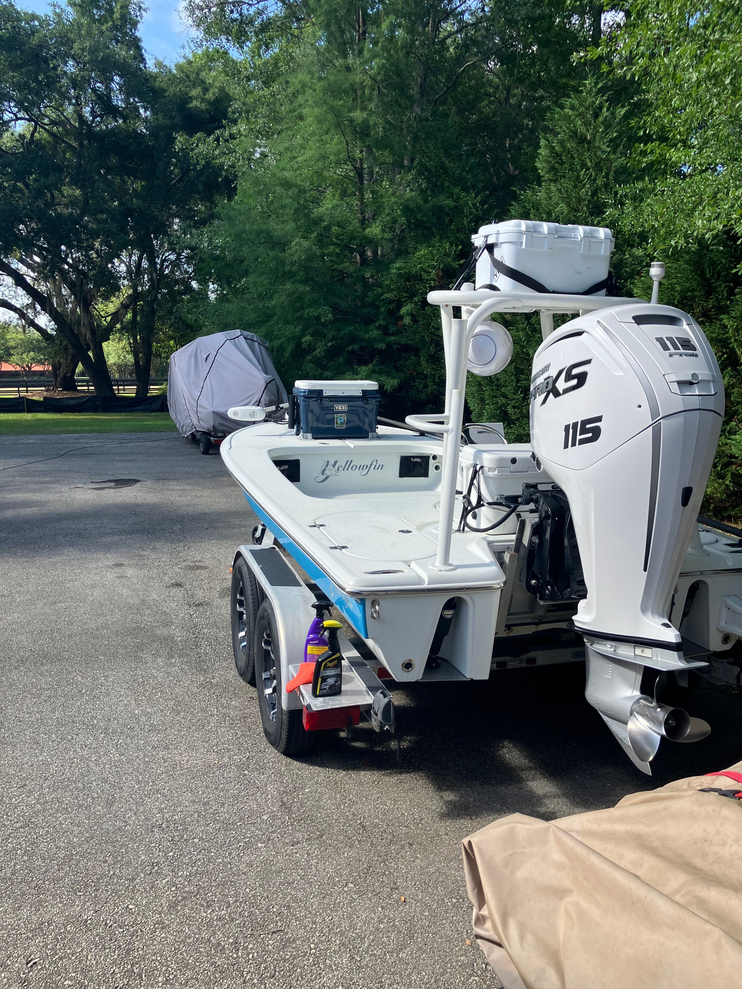 2007 Yellowfin 17 Skiff boat with outboard motor on trailer.
