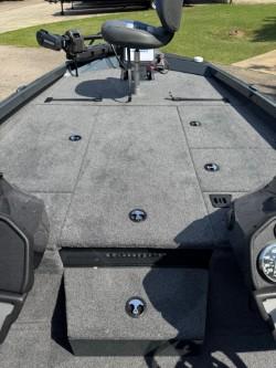 Interior view of Ranger RT198P 2025 boat, gray carpet flooring.