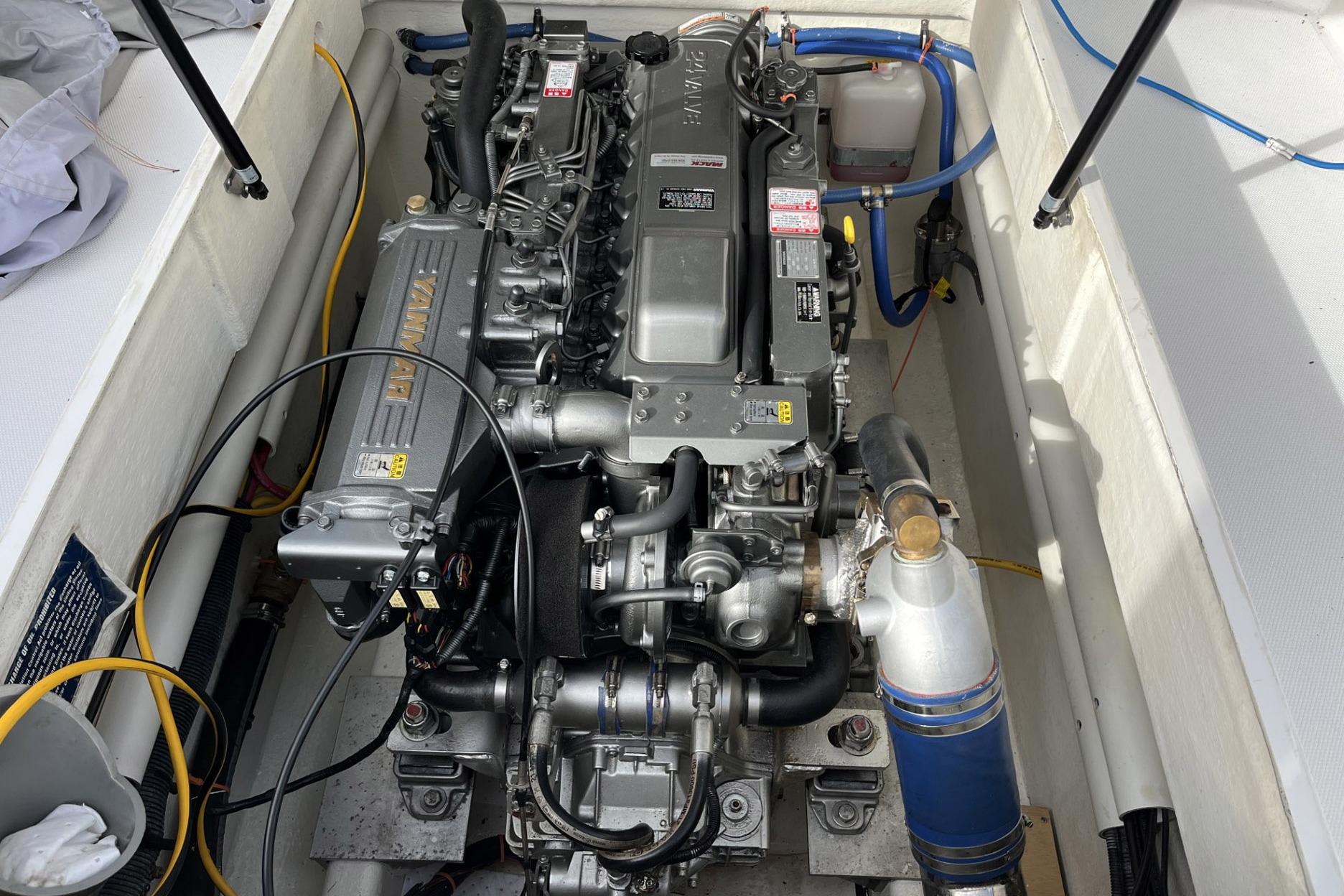 Engine compartment of a 2008 True World Marine TE2810 boat, featuring a Yanmar engine.