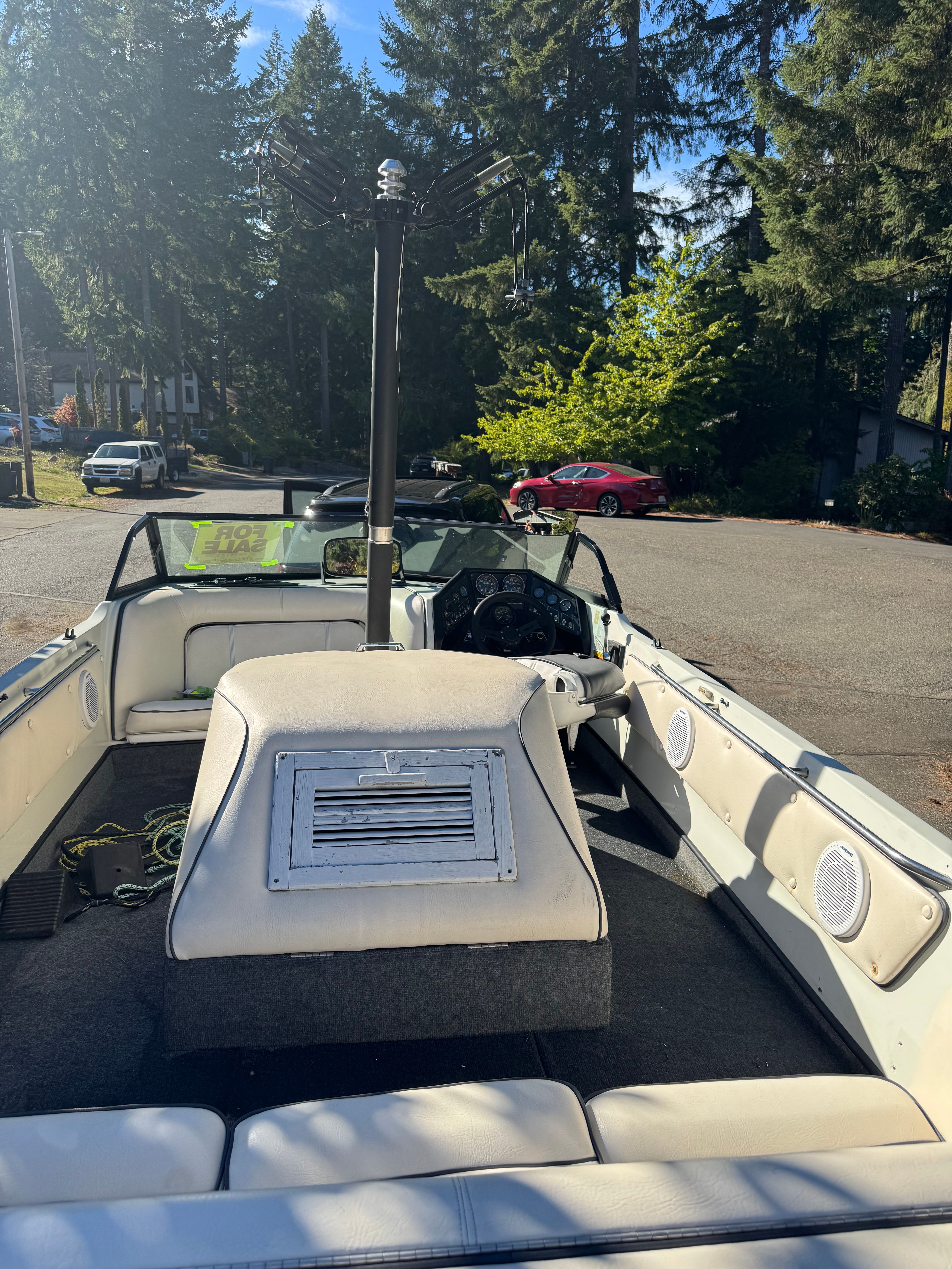 Interior view of a 1990 Supra TS6M boat outdoors.
