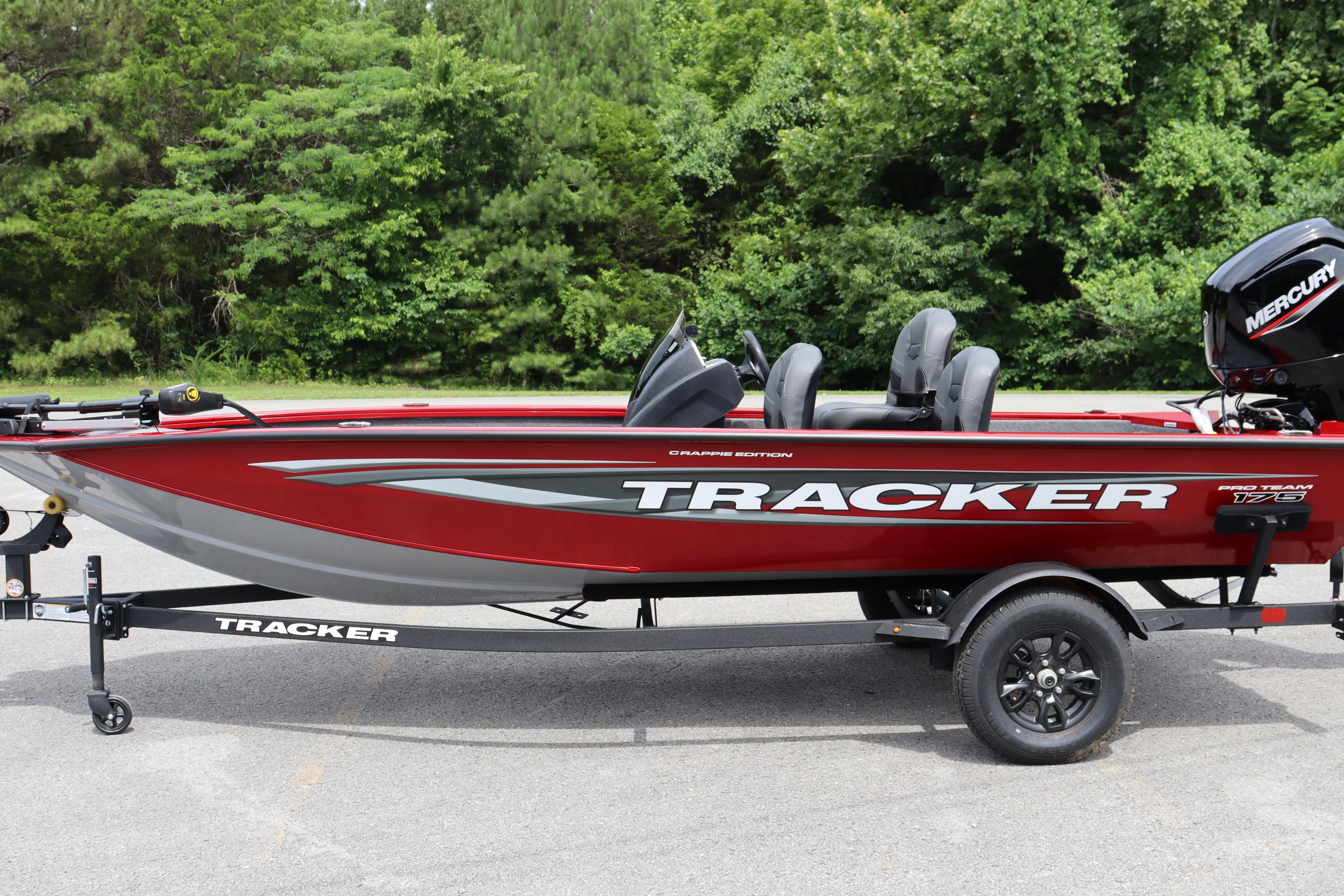 2026 Tracker Pro Team 175 Crappie Edition boat on trailer, red with Mercury engine.