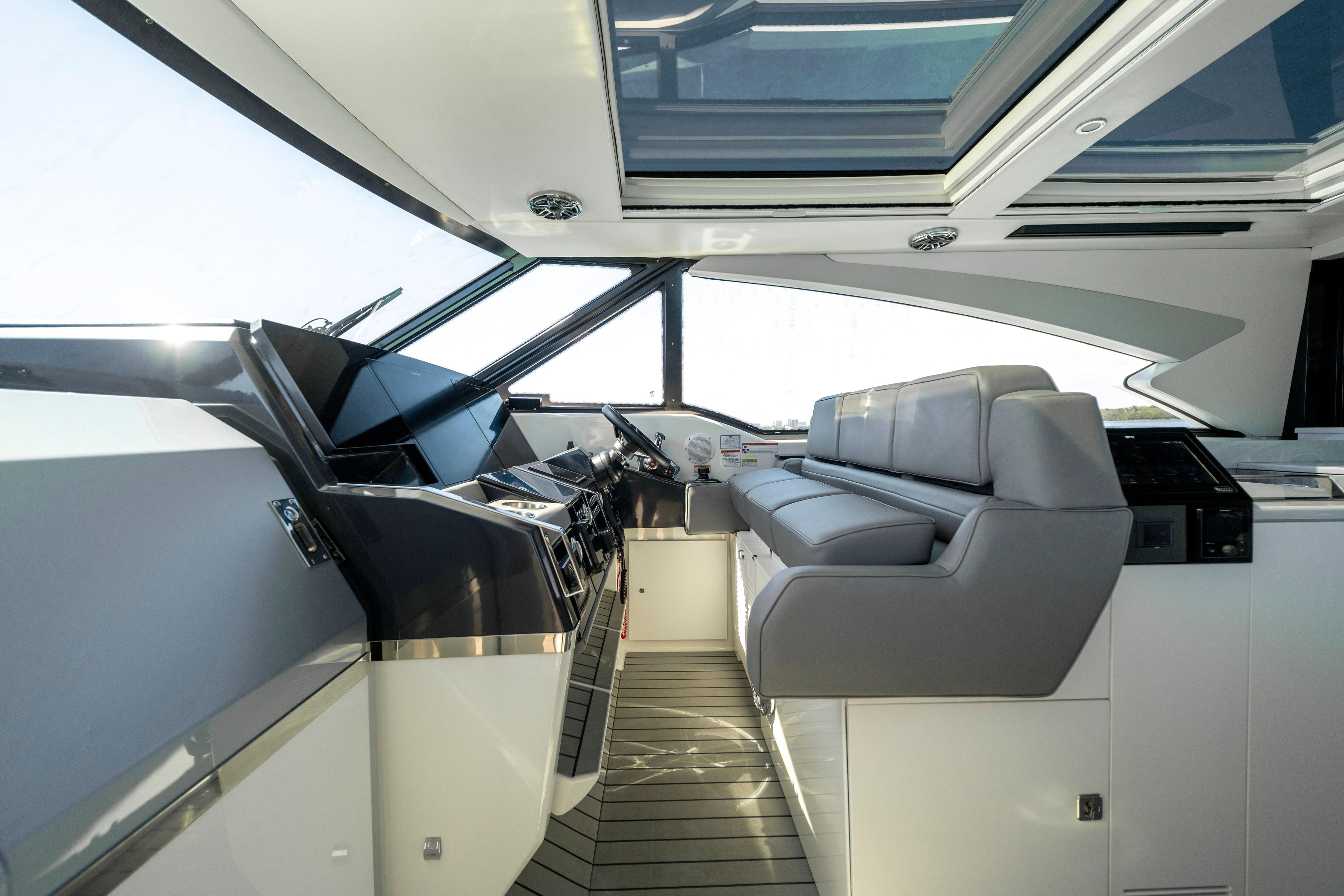 Interior of 2022 Formula 500 Super Sport Crossover yacht with modern helm and seating.