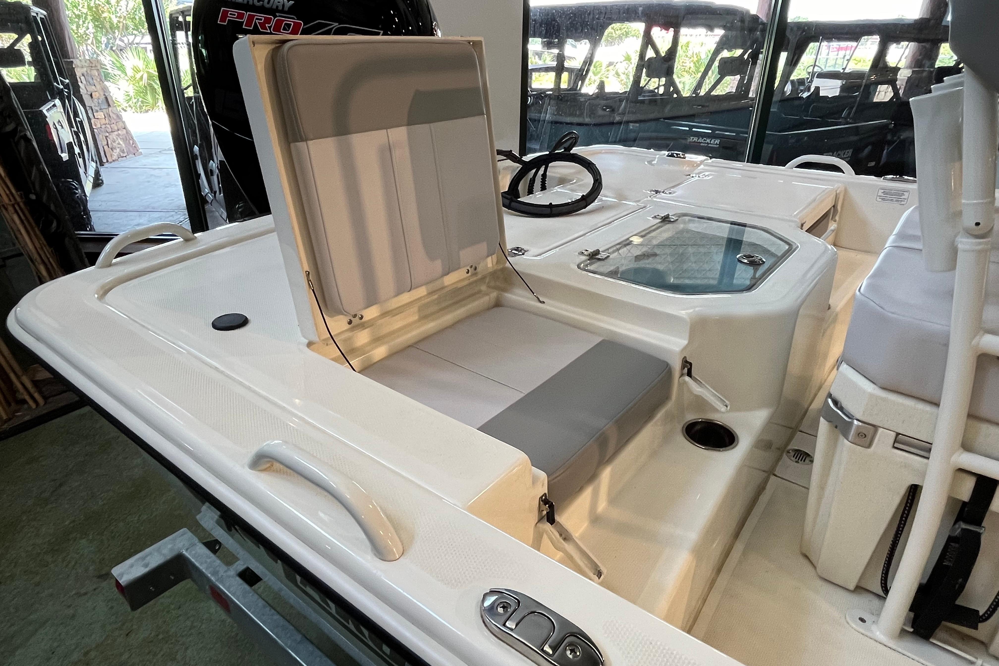 2024 Mako Pro Skiff 19 CC interior with seating and steering console.