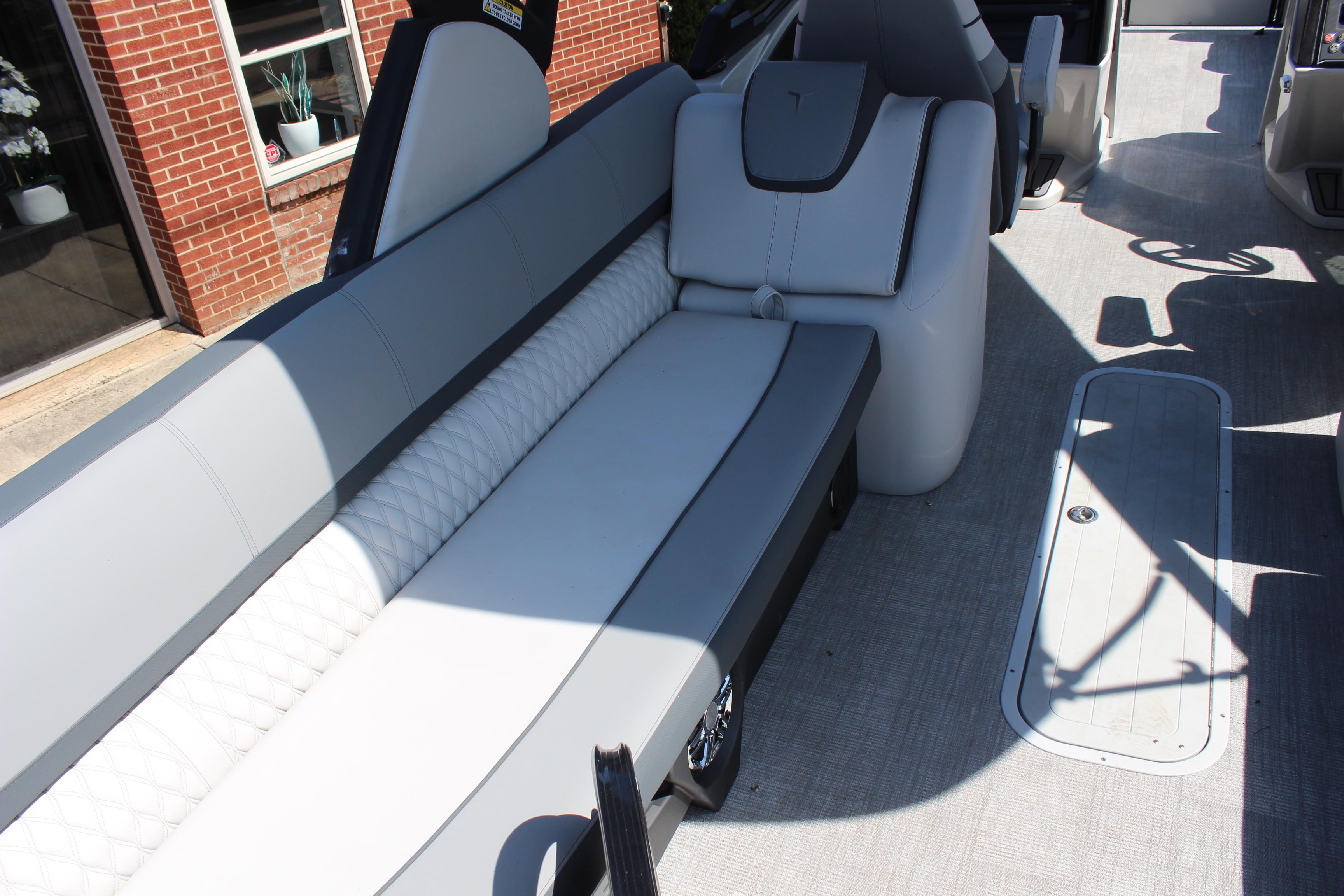 2025 Tahoe Pontoon Cascade Quad Lounge Windshield interior with sleek seating and modern design.