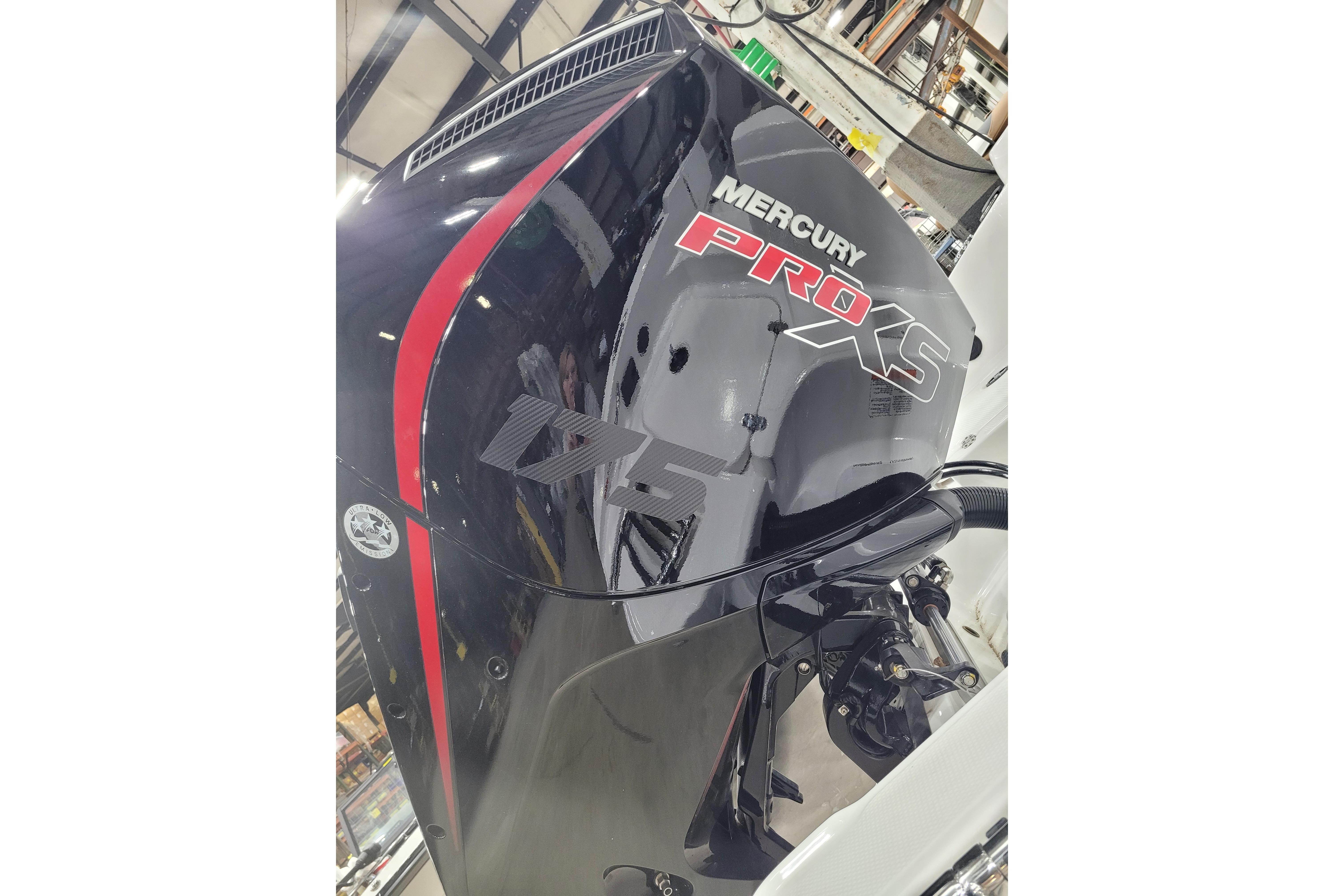 Mercury Pro XS engine on a 2026 Tahoe 2150 boat, featuring sleek black design.